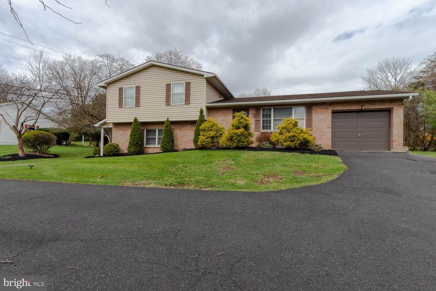 Student Licensed Property in the State College Borough! Well-maintained split-level home offering flexibility, income potential, and a highly desirable State College location. This property features a 3-bedroom, 2-bathroom main residence along with a separate 1-bedroom, 1-bathroom lower-level apartment—ideal for rental income, extended family, or an owner-occupant investment. The main dwelling offers a spacious and functional layout with a comfortable flow between the living room, dining area, and kitchen. The bedrooms are well-proportioned and include a primary bedroom and bathroom. The lower-level apartment includes a private entrance, kitchen, living area, and bedroom suite, offering strong rental appeal. Each unit has access to a separate unfinished basement area, providing convenient storage and a laundry area. The property has two rental permits and two student rental licenses permitting up to three unrelated occupants for the property.  Additional features include an attached garage, off-street parking, a rear porch, and a wonderful yard.  Conveniently located near Penn State University and downtown State College!  Owner is an Inactive PA Licensed Real Estate Broker.