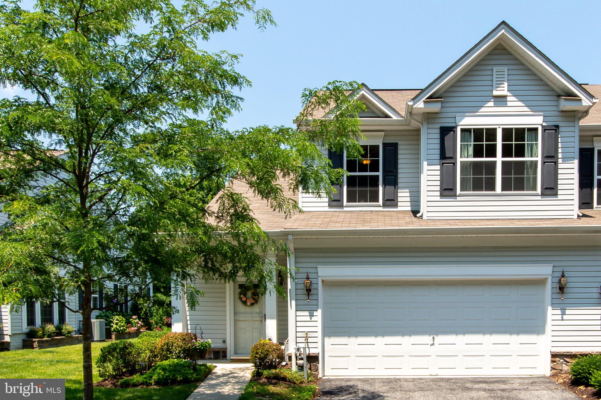 Worry-free living in this 55+ Community! Lawn care, snow removal, walking/bike trail, trash/recycling, and community center are all included! Dust the gourmet chef's kitchen in all-purpose flour with ample granite countertop space, stainless steel appliances, maximized cabinetry, breakfast bar, and double-door pantry. Kitchen opens into the living room where you can relax with sun-filled high ceilings, crown molding, gas fireplace, gleaming hardwood floors, and a walkout to the backyard deck. Main level master bedroom with a walk-in closet has tons of windows overlooking gardens, woods, and deck! Luxuriate in the spa-like master bathroom's soaking tub, shower, and double vanity. Main level also includes a formal dining room with hardwood flooring and large windows, and a laundry room with a new, high efficiency washer/dryer combination, which connects the kitchen to the oversized 2-car garage with driveway. Upstairs is a guest bedroom, loft and/or "3rd bedroom," full bathroom, and bonus room that can be flexibly used as an office, media room, or for storage. Built-in fire suppression system included. Hub Garth is a no outlet street with peace and quiet, and no through traffic, surrounded by the silent comfort of woods and tall trees. Easy access to Route 32 and I-95. Just 2 miles to Giant, Weis Markets, and Historic Savage Mill. Additionally, a 15 minute drive to the award-winning Howard County General Hospital, ranked in the top 5% of hospitals in the US and member of Johns Hopkins Medicine. Visit before it's gone!