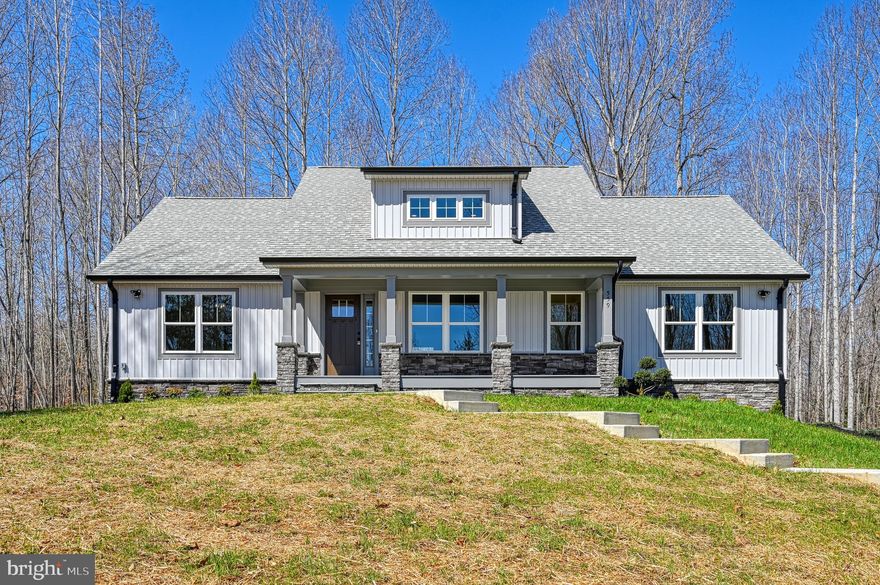 Build Complete, Home is READY! Welcome to 559 Overton Road, a brand-new Craftsman-style home featuring 4 bedrooms and 3 full bathrooms, located on the private side of Lake Anna in the desirable Overton Fork community. This thoughtfully designed home offers exclusive lake access, a boat slip, and is just a short walk to the common area with all the amenities you need to enjoy lake living to the fullest.

Set on a one-acre lot that backs to trees, this property offers beautiful views and a lake lifestyle. The exterior has been beautifully finished with extensive hardscaping, including retaining walls, professional landscaping, and a concrete walkway that leads to the covered front porch. Exterior lighting highlights the architectural features of the home and creates a warm, inviting atmosphere in the evenings. Every detail has been considered, making this home move-in ready both inside and out.

Inside, you’ll find upgraded finishes throughout. The open floor plan features luxury vinyl plank flooring, lush carpet, upgraded lighting fixtures, and an abundance of natural light. The kitchen offers upgraded countertops, a center island, stainless steel appliances, and a walk-in pantry. The living room is centered around a cozy gas fireplace, perfect for relaxing after a day on the water. The primary suite features a spa-like en suite bath with a soaking tub, walk-in shower, and large walk-in closet.

The fully finished walkout lower level adds even more living space and versatility to this home. It includes a large recreational area that’s ideal for a game room, home theater, or additional family room. There is also a fourth bedroom, a full bathroom,  and a bonus room. With multiple access points to the outdoors, this level seamlessly connects to the backyard, making it perfect for entertaining.

Additional features include a side entry two car garage with gorgeous doors and extra storage space. A paved or concrete driveway upgrade option is available at a separate cost, ask us for more details. 

Overton Fork is a lake-access community on the warm, private side of Lake Anna. Homeowners enjoy access to a private common area with a beach, boat launch, swimming, fishing, and water sports. This home includes a boat slip, giving you easy and direct access to everything Lake Anna has to offer.

If you’re looking for a brand-new home with upgraded features, private lake access, and a boat slip, 559 Overton Road is ready for you.