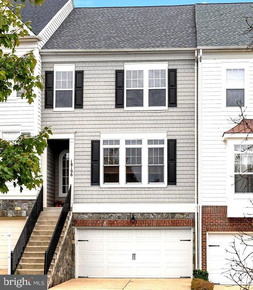 Updated Pricing....This is a MUST SEE townhome in a MUST SEE community!  LVP FLOORING (2023), WATER HEATER  (2021), HVAC (2019), PRIMARY BATH (2021), WINDOWS  (2019).
 Just pack your bags!  
Step inside this home and you will find hardwood throughout the main level, high ceilings with gorgeous crown molding,  and a layout that is ideal for everyday living and entertaining. Notably, EACH LEVEL HAS A BUMP OUT, adding extra space and character on each floor.   On the main level is a very large living room, a well thought out kitchen with stainless appliances & bar seating, a cozy sitting room with a fireplace, and a spacious dining space.  Downstairs you will find an entry from the garage, a full bath, a cozy family room with a fireplace & built-ins, plus space for a desk.  This home is rounded out upstairs on the third floor with a spacious primary bedroom with TWO walk-in closets, an updated primary bathroom, two additional bedrooms, a full bath off the hallway, and a laundry room. 
The Lakes at Red Rocks is convenient to everything!  You will love all this community has to offer with the walking trails, open spaces, and the community lake, pool, & tennis courts.  In addition to all the community has to offer, you'll love being a few short steps from the Red Rocks Nature Preserve and a short drive to Route 7, Wegmans, Leesburg Villages, Costco, Target, AND MORE!