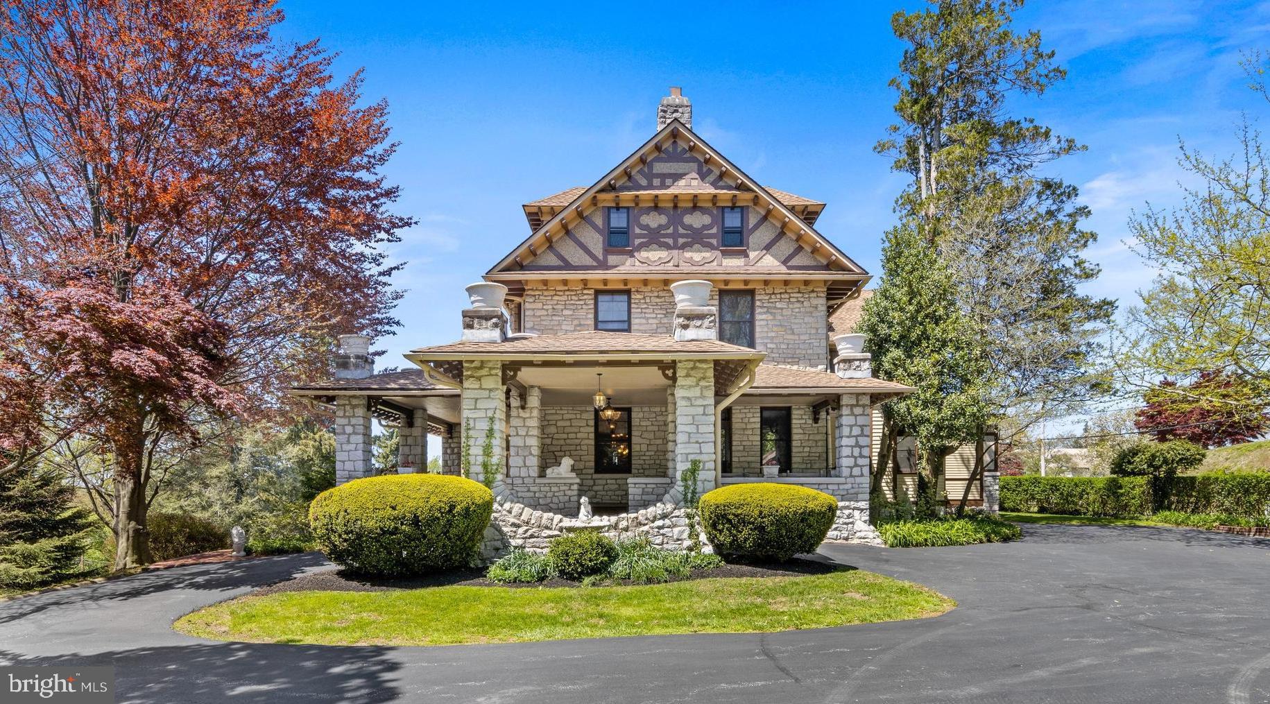 Welcome to Eyre View at 611 N. High Street; located on a full acre of land in the highly sought-after Northeast quadrant of the West Chester Borough. This stunning Victorian/English Tudor was the original home of Senator T. Lawrence Eyre and built circa 1898 by Joseph Miller Huston who was made famous by the construction of the Pennsylvania State Capital building in Harrisburg. Purchased in 1972 by the current owners, this home has been meticulously restored to its original historic beauty with spectacular architectural detail. As you pull up the driveway from N. High Street, you are led to the Porte Cochere and greeted by a beautiful wrap around porch with panoramic views of gorgeous sunsets and overlooking the West Chester Country Club. The front door entrance boasts a Grand Foyer with center staircase, chestnut wainscoting and hand carved gargoyles. The foyer is flanked by a Rococo style music room with original crystal chandelier and restored gold leaf detail and a Parlor/Living Room featuring a large fireplace surrounded by carved Corinthian columns and coffered ceiling. The formal dining room features a gas fireplace with custom built-in storage for all your entertaining needs, embossed ceiling and a statement Victorian chandelier. The heart of the home is found in the light and bright custom gourmet kitchen. Warm up by the Italian carved, white marble fireplace (ready for a gas insert) and cook to your hearts desire in this custom kitchen featuring two ovens, commercial cook top, subzero frig, two dishwashers and direct access to the hardscape patio and pool. The second floor features a large master bedroom en-suite with a grand dressing room, two additional bedrooms and laundry room with tons of extra storage, including a cedar closet. On the third floor you will find two bedrooms, full bath and original over-sized billiard room with wood burning fireplace. Prime Location, Award-Winning School District, Low Taxes and walking distance to local parks, shops and restaurants throughout the West Chester Borough - A MUST SEE! All buyers must be pre-qualified prior to showing.