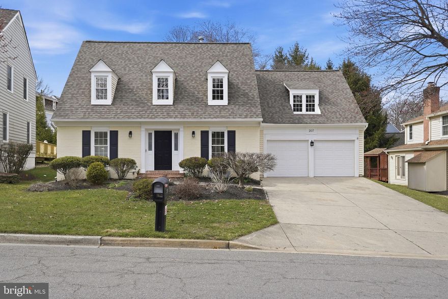 OPEN HOUSE SAT & SUN, 1-3. Welcome to 207 Upshire Circle in Washingtonian Woods, one of Gaithersburg’s most sought-after neighborhoods. This exceptionally updated home offers over 4,000 finished square feet across three beautifully finished levels, blending modern updates with timeless design.  

This Alfandre-built Chadwick model features 4 bedrooms and 3.5 baths with an open-concept layout and gleaming hardwood floors throughout the main and upper levels. The main level includes a private office, a living room with a bar area, a dining room, and a fantastic mudroom with walk-in pantry. The dramatic two-story gathering room has a gas fireplace with a floor-to-ceiling marble surround. The European-inspired kitchen showcases frameless cabinetry, premium integrated appliances, quartzite countertops, and a 10.5-foot long island perfect for everyday living and entertaining large gatherings.

Upstairs, the primary suite offers two full closets, including a spacious walk-in with custom shelving, 2 storage closets, and an updated ensuite bath with double-sink vanity and spa-sized walk-in shower. Three additional spacious bedrooms, two linen closets, and an updated hall bath complete the level. The finished lower level features a bonus room, a recreation area, a full bathroom, and ample storage.

Enjoy the rear deck and backyard with mature trees. Updates include windows, roof, HVACs, hot water heater, Tesla EV charger, and smart home-enabled outlets plus more.  This home is move-in ready and just steps from  Washingtonian Woods Park.  The park boasts 22 acres of walking trails, two tennis courts, one basketball court, a large open field, a lake and a playground.  The home is conveniently located near I-270, the ICC, Rio, Downtown Crown, and Kentlands.