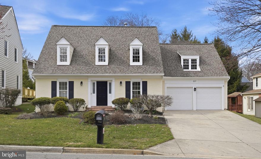 OPEN HOUSE SAT & SUN, 1-3. Welcome to 207 Upshire Circle in Washingtonian Woods, one of Gaithersburg’s most sought-after neighborhoods. This exceptionally updated home offers over 4,000 finished square feet across three beautifully finished levels, blending modern updates with timeless design.  

This Alfandre-built Chadwick model features 4 bedrooms and 3.5 baths with an open-concept layout and gleaming hardwood floors throughout the main and upper levels. The main level includes a private office, a living room with a bar area, a dining room, and a fantastic mudroom with walk-in pantry. The dramatic two-story gathering room has a gas fireplace with a floor-to-ceiling marble surround. The European-inspired kitchen showcases frameless cabinetry, premium integrated appliances, quartzite countertops, and a 10.5-foot long island perfect for everyday living and entertaining large gatherings.

Upstairs, the primary suite offers two full closets, including a spacious walk-in with custom shelving, 2 storage closets, and an updated ensuite bath with double-sink vanity and spa-sized walk-in shower. Three additional spacious bedrooms, two linen closets, and an updated hall bath complete the level. The finished lower level features a bonus room, a recreation area, a full bathroom, and ample storage.

Enjoy the rear deck and backyard with mature trees. Updates include windows, roof, HVACs, hot water heater, Tesla EV charger, and smart home-enabled outlets plus more.  This home is move-in ready and just steps from  Washingtonian Woods Park.  The park boasts 22 acres of walking trails, two tennis courts, one basketball court, a large open field, a lake and a playground.  The home is conveniently located near I-270, the ICC, Rio, Downtown Crown, and Kentlands.