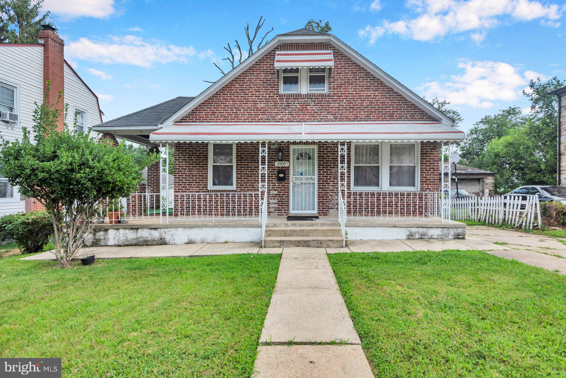 Discover the potential of this all-brick Cape Cod in Northwest Baltimore’s beloved Cylburn neighborhood! Owned and cherished since 1964, this spacious detached home sits on a generous lot with wide front and back lawns, a fenced backyard, and a 3-car driveway—ideal for summer gatherings or a garden oasis. The wraparound porch offers a peaceful perch along a tree-lined street. Inside, you’ll find hardwood floors, arched doorways, and classic charm. The main level features a cozy living room with a decorative fireplace, two bedrooms, a full bath, and a formal dining room off the galley-style kitchen. Upstairs, a large loft offers space for a third bedroom with sitting room or 2 home office spaces. The detached garage is perfect for a workshop, studio, or storage. The expansive high-ceiling basement provides future potential for a rec room, additional bedrooms, or an in-law suite. Quiet location near Cylburn Arboretum, Sinai Hospital, I-83, and downtown. Timeless character and endless possibilities—schedule your tour today!