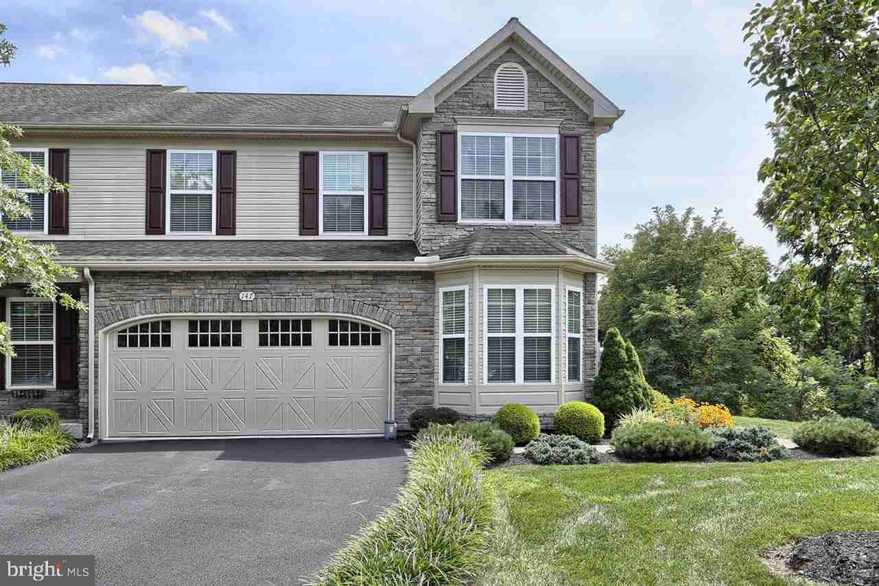 Private wooded setting & vaulted 1st flr master in luxurious end unit w/3,000 fin sqft. 2 Car garage, stone accents & bay window. Designed w/flair & function eat-in kitchen w/gas stove, granite tops w/peninsula & pantry. Gleaming hardwood flrs. Vaulted LR w/gas FP w/oak rail open to Loft. MBR w/dbl bowl vanity, jetted tub & sep shower. 1st fl laundry rm. Composite deck w/vinyl rail & steps to private yard. Prof fin LL w/full daylight. Convenient location & access to 81.