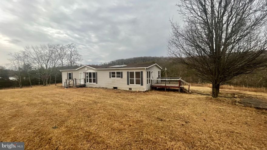 Call now to see this priced to sell double wide manufactured home with 3 bedrooms, 2 bathrooms, living room, and kitchen . All this is situated on 4.9 rolling and wooded acres located in Sherman Estates. For storage there are 3 sheds on the property. Enjoy the mountain views plus all the wildlife including  deer, bear, turkey, squirrel and more. At night you can enjoy peace and  quiet and serenity looking at the constellations including the big dipper, little dipper and Orion. Plenty of stars and a bright moon on a night with a clear sky. Move to WV and become a Mountaineer.