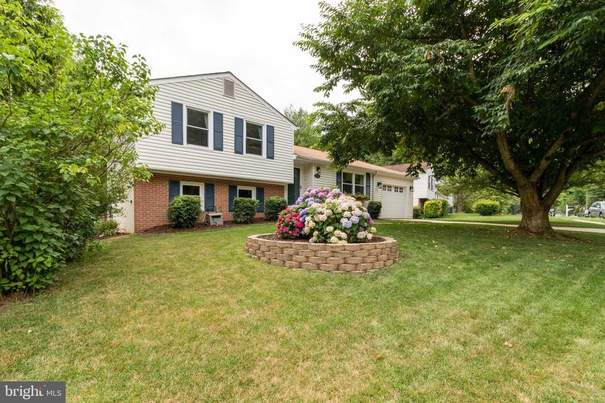 This beautiful home has been lovingly remodeled from top to bottom! This 3 bedroom, 2 bath features new flooring on the main level and hallway upstairs (2019), granite countertops, and new kitchen island and applicances. Newer roof and windows,  HVAC and AC were replaced in 2020. The property is beautifully landscaped with a privacy fence and new inviting patio.