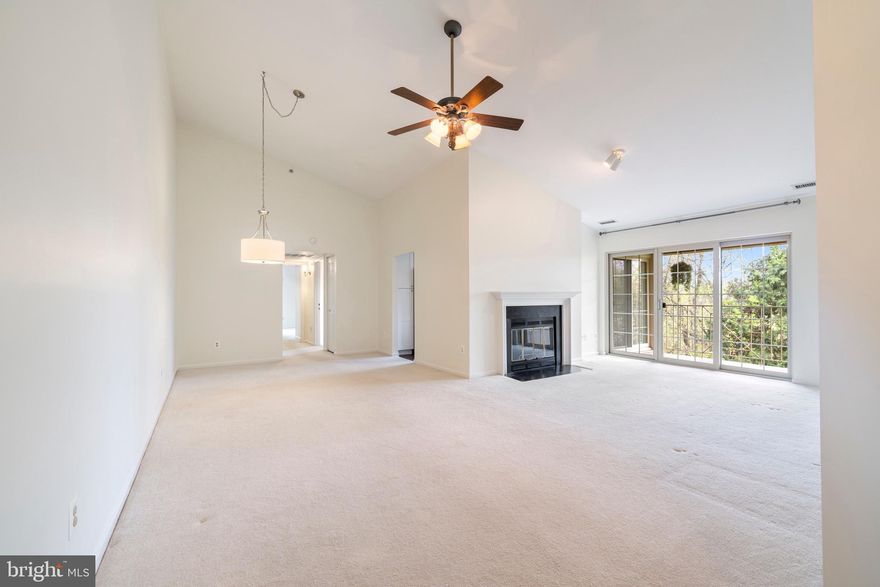 Welcome to your serene retreat in the heart of Loveton Farms! Nestled on the third floor, this exquisite condo offers a tranquil escape with picturesque views of the surrounding woods.

Step inside and be greeted by the airy ambiance enhanced by lofty high ceilings, creating a spacious and inviting atmosphere. The open layout seamlessly integrates the living and dining areas, perfect for both entertaining and everyday living.

The updated kitchen is a chef's delight, boasting modern amenities and sleek finishes. Recent updates include new cabinetry, under cabinet lighting, dual drawer dish washer, new microwave, recently replaced disposal, and added Hunter Douglas remote controlled skylight. Whip up culinary delights while enjoying the natural light streaming in through the windows, and savor your meals in the quaint dining nook or balcony with the soothing backdrop of nature. Balcony flooring was upgraded to composite decking in 2018 and does not require four year sealant maintenance! 

Retreat to the two generously sized bedrooms, each offering comfort and privacy. The primary suite features its own ensuite bathroom and walk in closet. The second bedroom is perfect for guests, a home office, or a cozy den.

Both bathrooms have been tastefully updated, offering ample added storage with stylish fixtures and contemporary design elements such as pocket doors that stow away and save space. 

Freshly painted walls throughout the condo add a touch of elegance and a blank canvas for your personal style. Additional updates include new windows, new window sills in 2024, and new HVAC drain pan in 2023.

Experience the perfect blend of tranquility and convenience in this meticulously maintained condo, where modern updates harmonize with the natural surroundings.