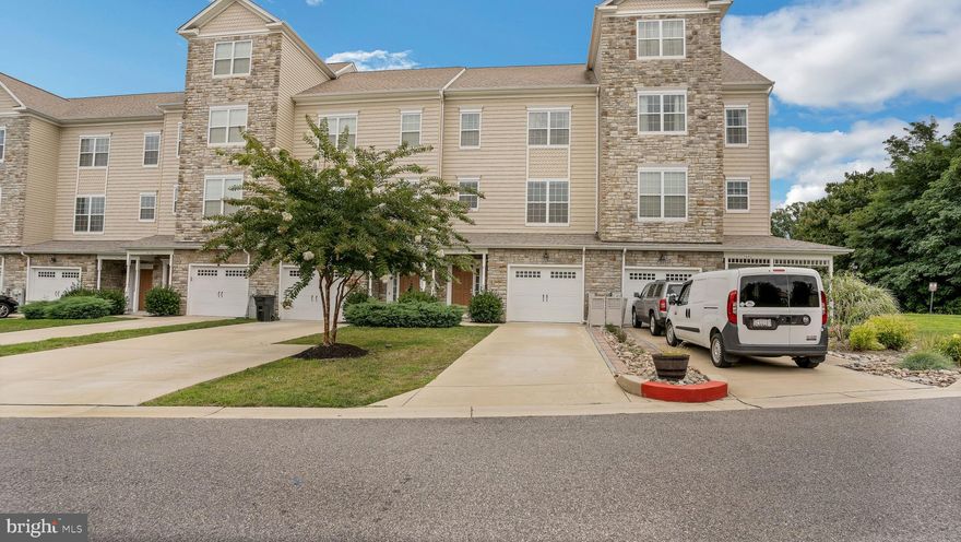 Just a hop, skip, and a jump away from the bay, the beach, the boardwalk and a variety of restaurants and shops. This home is 5 years young! You will fall in love with this open floorplan, all the new appliances,  the granite countertops, and gorgeous kitchen cabinetry. All 3 bedrooms and the laundry room are located on the upper level! The lower level is finished with an extra 1/2 bathroom, and living area that could be used as an office, gym, craft room, etc... YOU get to choose! The walk out lower level take you into the privately fenced in back yard. This townhome community offers front lawn maintenance  and trash removal. Short commute to DC, Andrews Air Force Base, and Annapolis.
