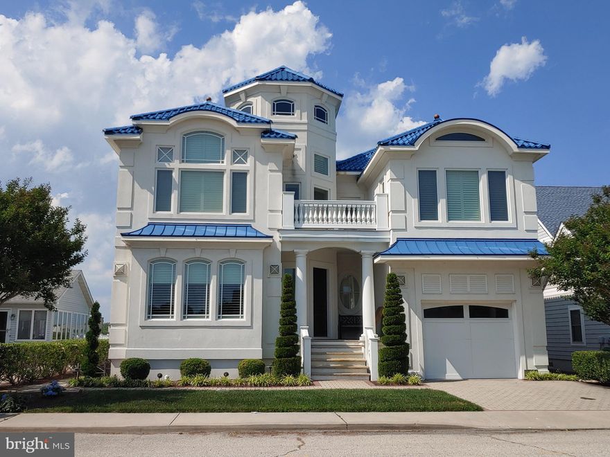 You do not want to miss this exceptional bayfront home with all the must-haves:  an in-ground heated pool, a boat lift for a 30’+ boat and jet ski lifts.  Built in 2008 with quality construction, this home features 6 bedrooms, 5.5 baths, an exquisite kitchen with a coffered ceiling, beautiful hardwood floors, quality cabinets, tiered granite counters and stainless appliances.  The owner’s suite has a gas fireplace, wet bar, wine cooler and a refrigerator.  Beautiful views from the dining area overlooking the pool and pier.  Tasteful appointments throughout.  Includes furnishings worth in excess of $150,000.