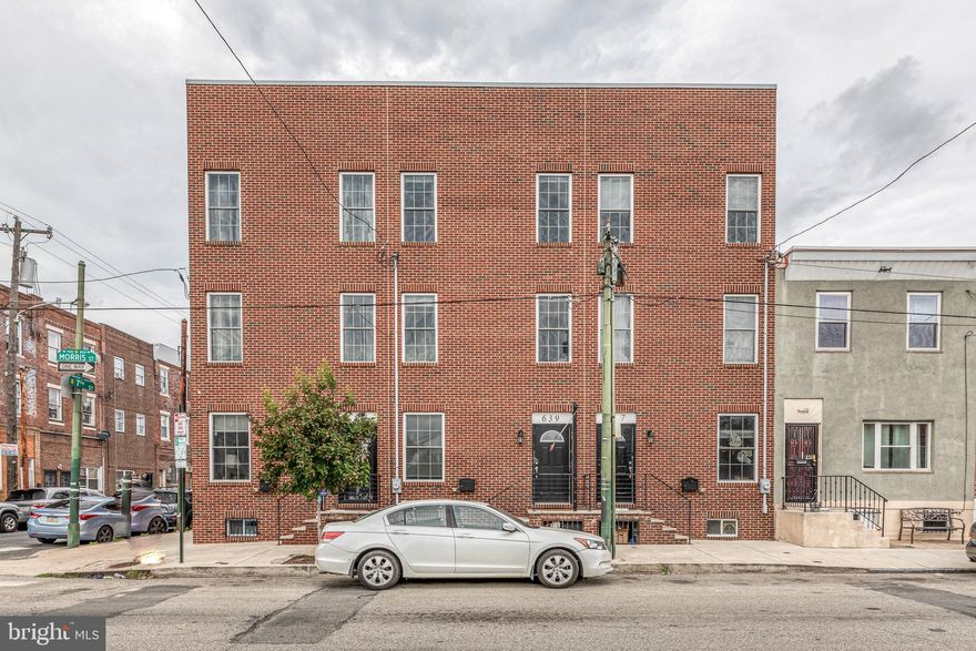 Welcome to 639 Morris St, your opportunity to live in one of Philly's favorite neighborhoods! With so many of the city's best bars and restaurants within walking distance, your biggest challenge will be choosing which one to visit each night. Multi levels of gracious living space offering 3 stories plus a finished basement. The open concept first floor features a spacious living and dining room with hardwood floors that continue throughout the home. The contemporary kitchen features 42" surround cabinets, stainless steel appliances, two breakfast bars, granite counters, and glass backsplash. On the second floor, a large owner's suite boasts an ensuite bath plus an additional spacious bedroom on the 2nd floor. On the third floor, find a second owner's suite with Whirlpool bath plus another large bedroom and hall bath on the 3rd floor. High quality carpentry features: wainscoating, crown moldings by European Craftsmen. Custom staircases with steel rails join all these levels. Rays of natural sunlight shine through the gleaming windows. Drink in the panoramic views of the city from the rooftop deck. The basement is fully finished with tile floor, multi closets and full bath. Rear yard finished in concrete surrounded by a privacy fence. 7 years remaining on TAX ABATEMENT.