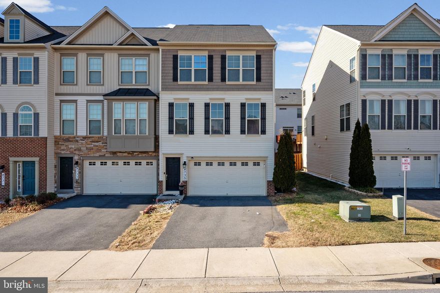 What an opportunity to own this stunning End Unit Townhome in the sought-after Manors At Ballenger Creek! The original owner has kept this home in immaculate condition for you to be able to move right in and call this beauty HOME! Enter on the first level through your two car garage and enjoy a first level rec room, full bedroom and full bathroom. As you move up to the second level you are greeted by a open floor plan with your Kitchen, Dining Room and Living Room. Beautiful wood floors throughout this level, tons of natural light really make this level special. The kitchen has high-end stainless steel appliances, beautiful granite countertops and a large island - great for those who love to cook, or entertain your friends and family. The large deck is right off of the kitchen and dining area - perfect for those summer cookouts. The third level is home to the primary suite that you have to see to believe - the closet space, the upgraded on suite bathroom with full walk-in shower - this one really is incredible. The third level has two additional spacious bedrooms and the laundry room. Don't forget to check out the cozy fenced in backyard with pristine landscaping - including fruit trees! Not only is this home incredibly special, but the Manors At Ballenger Creek are super convenient to amenities and major commuter routes (15, 70 and 270). Come take a look and call this one HOME!