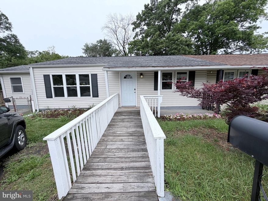 RECENTLY  UPDATED DUPLEX WITH HANDICAP ACCESSABILTY. FRESHLY PAINTED. NEW KITCHEN NEW FLOORING THROUGHOUT UPDATED BATHROOMS ONE IS HANDICAP ACCESIBLE. LARGE BACK YARD WITH 2 SHEDS