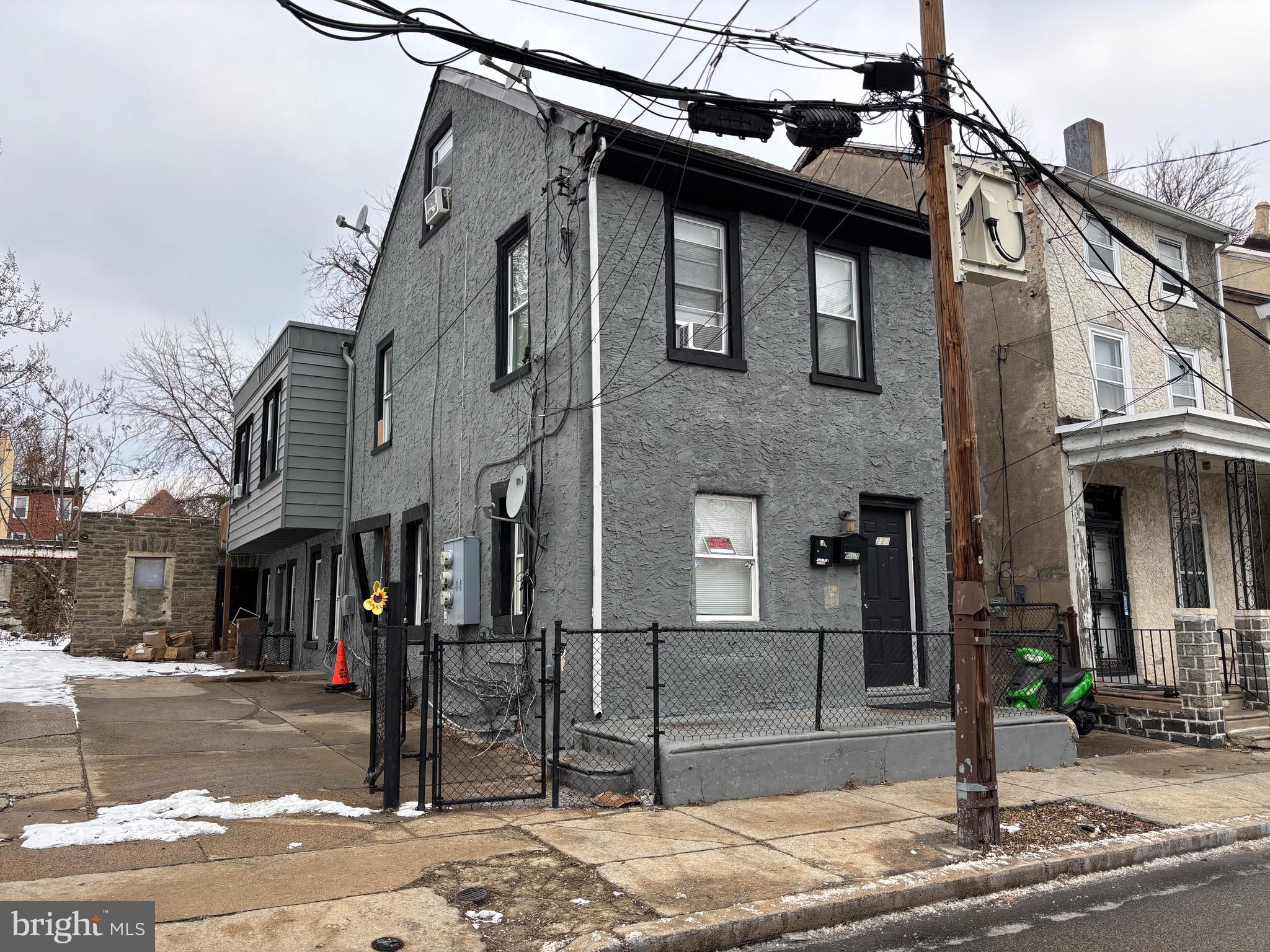 Excellent income potential at this double lot property! Includes 223 E Ashmead. Property is a legally zoned three unit building with active rental licenses located in Germantown area of Philadelphia. This triplex is one large 2-3 bedroom/1.5 bathroom unit with a loft, one 1 bedroom/ bath, 1 studio with separate kitchen and bath. There is a large space in the back that can be converted into garages for additional income, or possibly another multifamily unit can be built (would need to be approved by zoning). There are 3 electric meters, brand new 240 electrical service and heads, 3 new water heaters, and new plumbing. Larger unit is getting $2200 PHA rent. Other two units are vacant and should bring in at least another $1800 in rent. Owner must sell! Make an offer! Package price deal available with purchase of 4220 Wallace Street and 6313 Bingham Street. Both also listed on the mls.