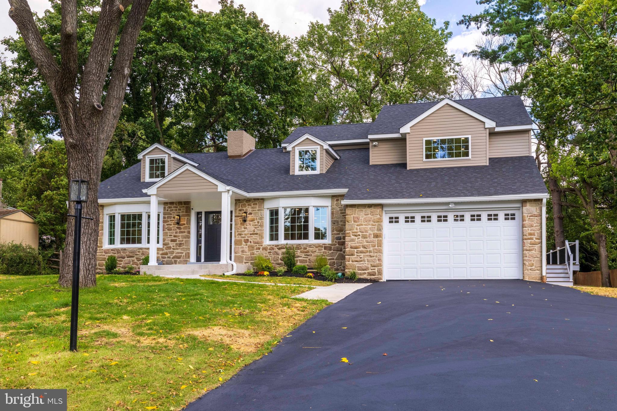 Stunning Remodeled 5-Bedroom Expanded 2-story home in Prestigious Crosswicks, Jenkintown/Rydal. This meticulously fully remodeled 3,500 sqft, 5 bedroom/3 full bath Expanded home has been completely updated and is bursting with modern upgrades and classic charm. The home sits on an exceptionally tranquil street in the sought-after Rydal area. Upon entering the home, you will be impressed by the open floor plan that leads to the gourmet kitchen featuring premium Thermador and Bosch appliances, custom cabinetry, and expansive surfaces ideal for hosting or family meals, as well as sliding-door access to the rear Timbertech PVC patio and backyard. The main level includes a versatile bedroom, perfect as a guest room or home office, while the second floor boasts four generously sized bedrooms, including a luxurious primary suite with ample closet space and a spa-like ensuite. Meticulously refinished hardwood floors run throughout the home. Additional upgrades include all new plumbing, electrical, and a high-efficiency HVAC system and water heater. Designed for both everyday relaxation and entertaining, this home blends classic charm with contemporary upgrades for effortless everyday luxury. Enjoy the peace of a quiet, tree-lined street while staying just moments from multiple train stations, Whole Foods, Starbucks, and the vibrant dining and shopping of Jenkintown and Rydal. Don’t miss this opportunity to own a stunning, move-in-ready home in a prime location. Schedule your private tour today and experience the perfect blend of luxury and location!