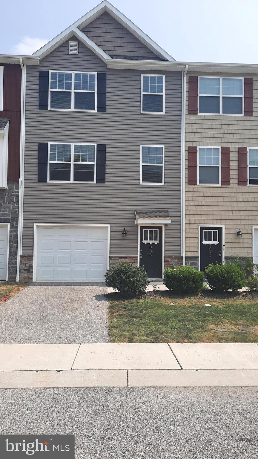 Beautiful townhome available in the very popular Admirals Quay development. This property features a first-floor bonus room, granite countertops, laminate flooring and third floor laundry.