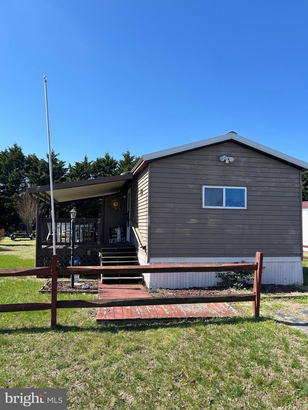 Photo of 34984 Sea Waye Lane, MILLSBORO, DE 19966 (MLS # DESU2108278)