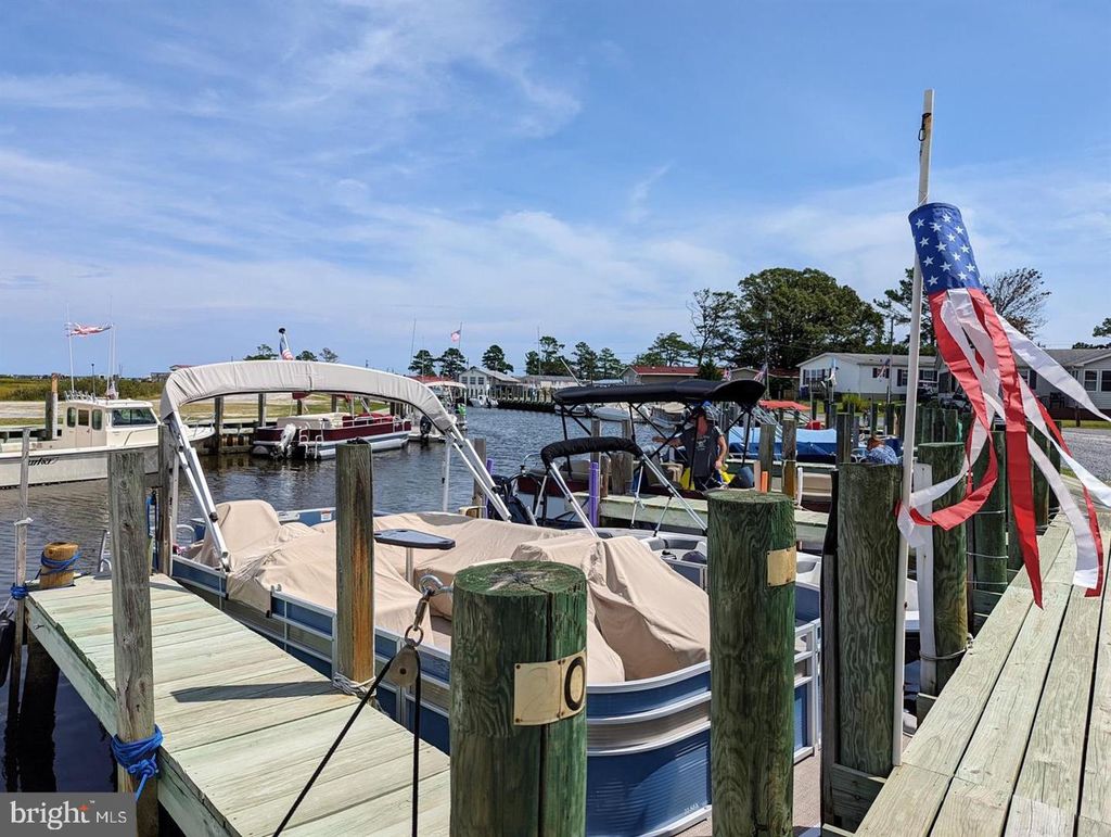 Photo of 34984 Sea Waye Lane, MILLSBORO, DE 19966 (MLS # DESU2108278)