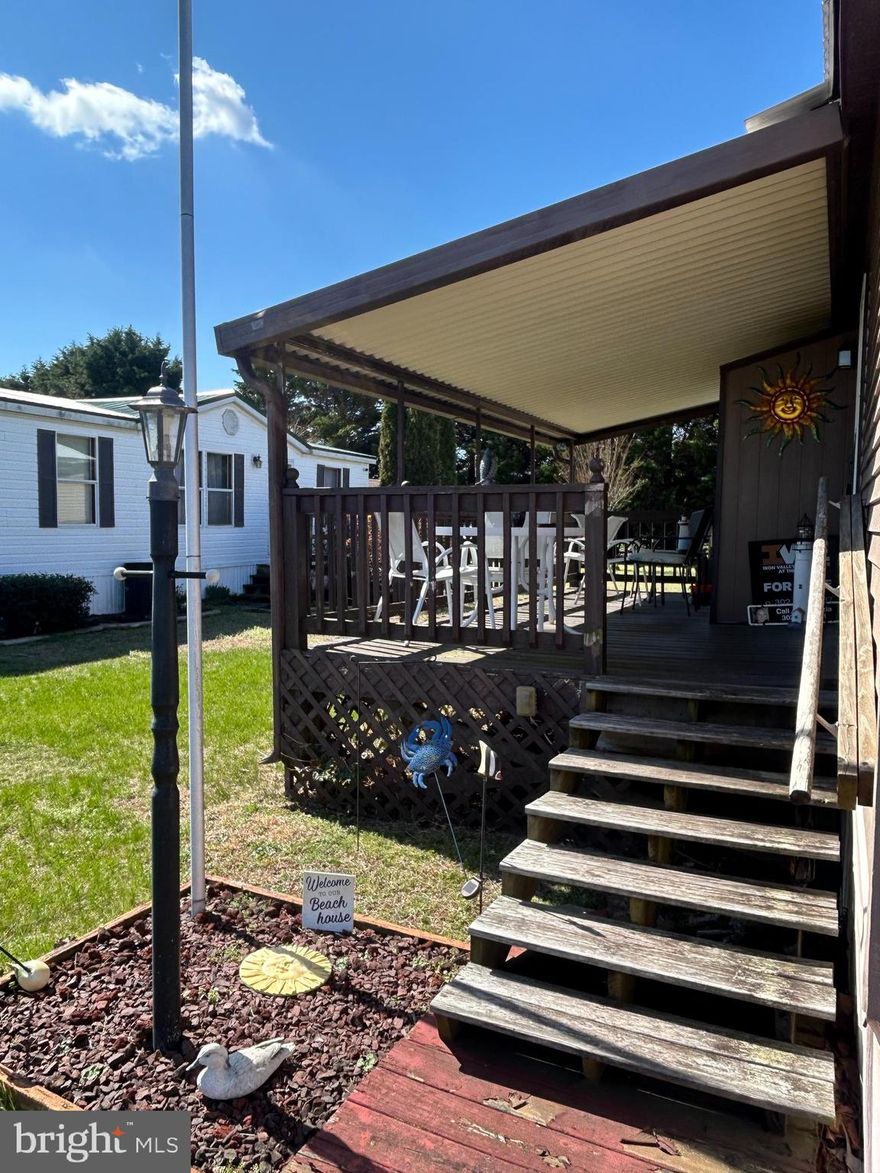 Welcome to your slice of Coastal Paradise in Rehoboth Shores Mobile Home Park! 🌊☀️

Experience the best of affordable coastal living with this charming 2-bedroom, 1-bath home located in the highly desirable gated waterfront community of Rehoboth Shores in Millsboro, Delaware. This is where summer family memories are made—from boating days to sunset dinners and everything in between.

Step inside to find a cozy, easy-living space perfect for relaxing after long days in the sun. Major updates have already been completed, including a brand-NEW  HVAC system (2025) and a NEW ROOF in (2020), NEW Flooring 2024, offering peace of mind so you can focus on enjoying every moment.

The real highlight is the lifestyle. Rehoboth Shores offers private boat docks with direct, navigable access to Rehoboth Bay, making it ideal for boating, jet skiing, and fishing adventures with family and friends. Cruise over to Paradise Grill for waterfront dining, live music, and fun-filled summer nights.

Enjoy community amenities like a refreshing pool, picnic areas, and a friendly coastal atmosphere that truly feels like a vacation every day. Whether it's mornings on the water, afternoons by the pool, or evenings with loved ones, this community is all about easy, carefree summer living.

✨ Highlights:

2 Bedrooms | 1 Bath
New HVAC (2025)
Roof replaced (2020)
Gated waterfront community
Boat docks available
Navigable access to Rehoboth Bay
Close to Paradise Grill
Community pool & amenities
Designed for unforgettable summer family fun

Don’t miss your chance to own the perfect beach getaway—where sunshine, water, and family fun come together! 🌴⚓