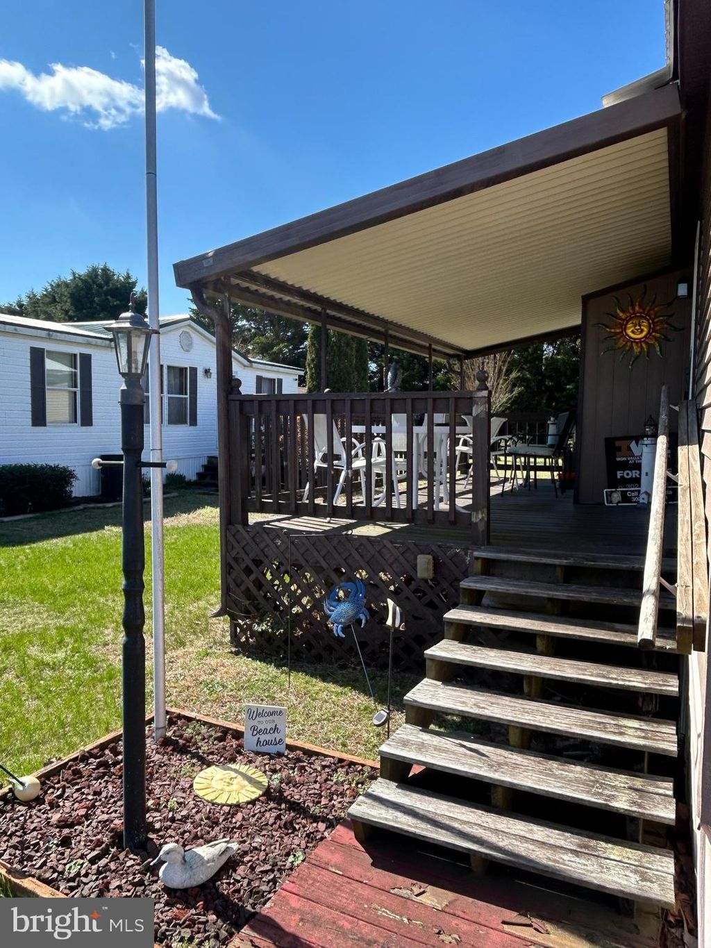 Photo of 34984 Sea Waye Lane, MILLSBORO, DE 19966 (MLS # DESU2108278)