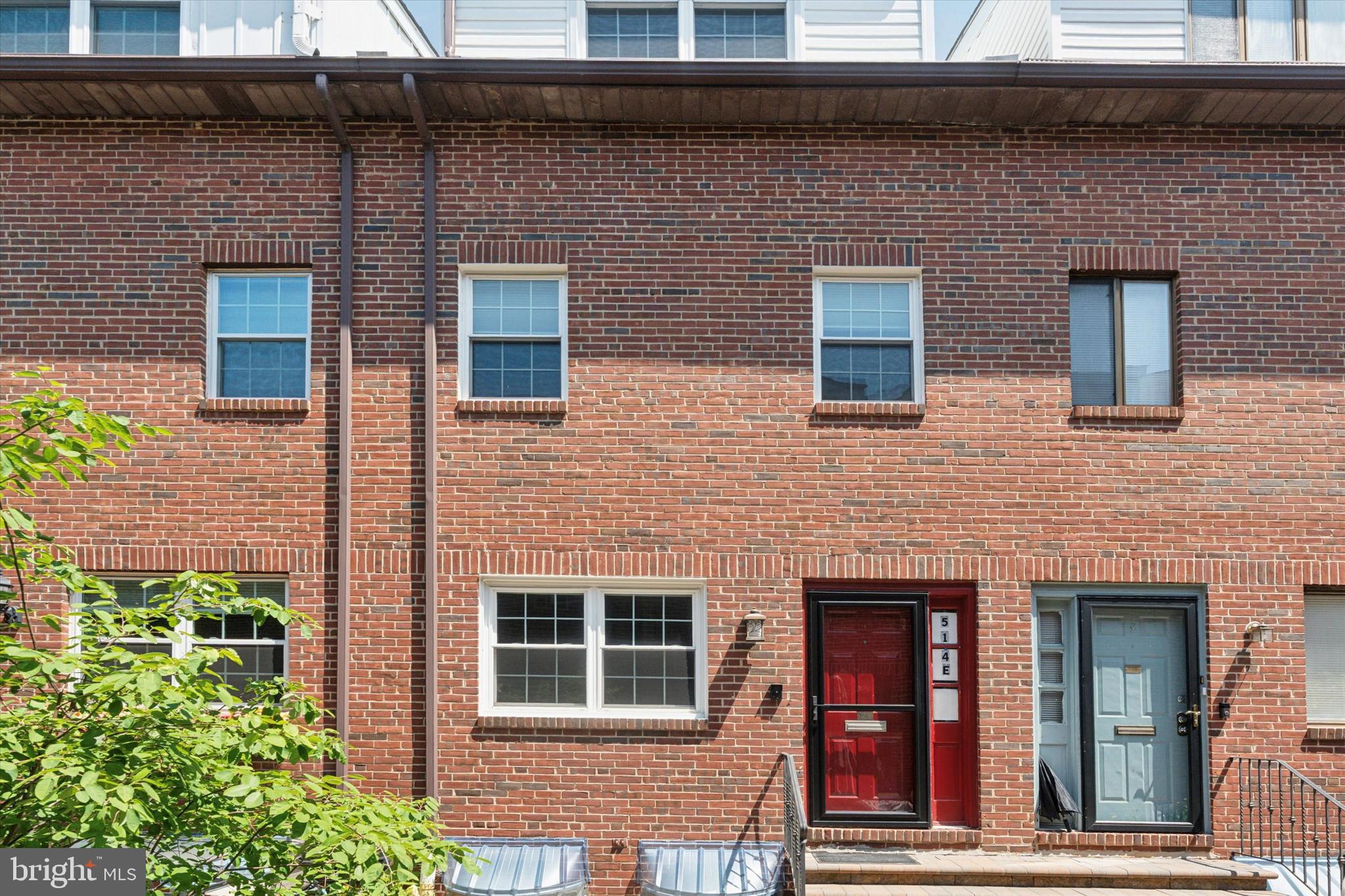 Welcome to 514 Randolph Court, a beautifully renovated 3-bedroom, 2.5-bath split-level home tucked away in a quiet, private courtyard in the highly sought-after Queen Village neighborhood. This spacious and thoughtfully updated home offers the perfect combination of modern amenities, versatile living space, and unbeatable walkability—plus the rare convenience of 1-car garage parking AND a second dedicated off-street spot directly across the street. Inside, you'll love the unique multi-level layout that gives each room its own sense of space and privacy. The sun-splashed primary suite features skylights with custom blinds and blackout shades, a designer en-suite bath with an oversized shower, and ample linen closet and additional attic storage spaces. The two additional bedrooms include custom closets and share a stylish full bath with a tub and more linen storage. The open-concept kitchen/dining area is perfect for entertaining, with granite counters, stainless steel appliances, and a breakfast bar. On the entrance level, the living room features built-ins and an electric fireplace, creating a warm, welcoming vibe. Just a few steps down are a half bath, laundry area, and the garage with built-in storage and an automatic garage door opener. Need more space? Head down to the finished basement—ideal for a home office, workout area, or den. Step outside to enjoy your charming courtyard, perfect for coffee, dinner, or catching up with neighbors. Living here means you're just steps from everything you love about city life: Headhouse Square Farmers Market, Fabric Row, South Street, Washington Avenue, restaurants, cafés, boutiques, gyms, and parks. Quick access to I-95, Columbus Blvd, and public transportation makes commuting a breeze—whether you're heading to Center City, the airport, or New Jersey. This is more than a home—it’s a lifestyle. The home is personally managed by the owner and is available as soon as you apply and are approved! The application link will be provided after you tour the home. A successful applicant earns 3x the monthly rent in gross income, has no criminal or eviction history, and has no more than one dog (weighing less than 35 lbs). A non-refundable pet fee of $250, if applicable. No cats, sorry. First, Last & Security to move in. Must carry Renter's insurance naming the Landlord as an Additional Insured.