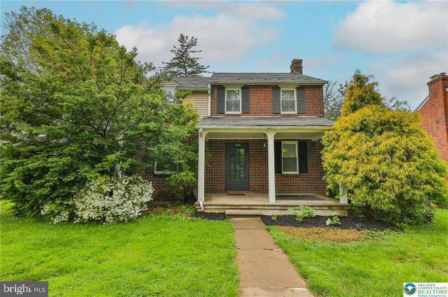Charming West Bethlehem Brick Colonial. Experience solid craftsmanship and timeless style in this highly sought-after West Bethlehem neighborhood. This 4-bedroom home features durable solid brick construction and elegant oak hardwood floors throughout the main living areas and bedrooms. Key Highlights: Modern Kitchen: Recently renovated with stylish finishes—perfect for the home chef. Living Room: Inviting and warm, anchored by a classic fireplace. MAJOR UPGRADE: Peace of mind comes included with a BRAND NEW ROOF scheduled for late May! Flexible Space: A partially finished basement offers great potential for a home office, gym, or playroom. Enjoy a perfect blend of character and peace of mind in a location that puts you minutes from everything Bethlehem has to offer.