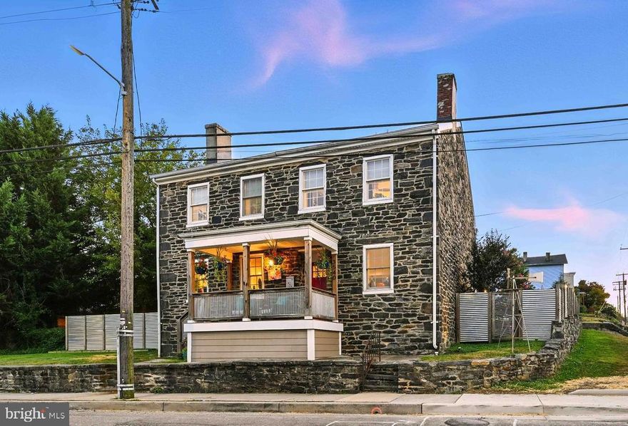 ******Historic Luxury in Baltimore’s Woodberry Neighborhood******

Step into a rare blend of history and modern elegance in this 1847 stone residence—originally two millworkers’ homes, now masterfully combined into one stunning property. Completely gutted and rebuilt with all new systems, a brand-new roof (2025), and full foam insulation, the home is designed for efficiency and year-round comfort. 

********The expansive main level offers spacious living and dining rooms, a fully equipped wet bar with ice maker, beverage fridge, and wine fridge, and a clever pantry/office hidden behind custom cabinetry. A chef’s kitchen flows effortlessly to a private patio with tranquil koi pond, perfect for lounging or al fresco dining, while a second terraced patio provides yet another outdoor retreat. 

*******The second floor features two large bedrooms with generous closets, a spacious den ideal as a library or media lounge, a full bath, and a laundry room. 

******Upstairs, the luxurious third-floor primary suite boasts two oversized closets, a walk-in shower with heated towel rack, a private bidet toilet room, and hidden storage. Outdoor living is equally impressive with a charming front porch offering sweeping views of the Baltimore skyline and Jones Falls Trail, newly paved parking for up to five cars—an exceptionally rare city amenity—secure fencing, 12-volt landscape lighting, and a 5’ x 11’ shed. 

*******Modern technology enhances the home with 10 exterior cameras, HDMI wiring, surround sound, Cat 6 cable, and Z-Wave enabled thermostats, door locks, and light switches. Nestled in Woodberry’s historic mill district, this unique home seamlessly blends 19th-century craftsmanship with 21st-century comfort and offers exceptional flow for both indoor and outdoor entertaining.