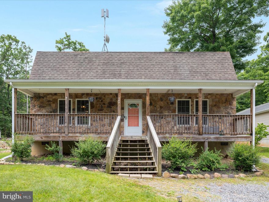 Welcome to 305 Winchester Dr — This stone-front beauty features wood laminate flooring throughout the main level and a freshly painted interior. The inviting covered front porch sets the tone for relaxed living, while the fully fenced backyard offers privacy and serenity, backing up to peaceful trees.

The kitchen is complete with a cooktop, wall oven, breakfast bar, and newer refrigerator and dishwasher. The main-level HVAC was replaced in 2022 for year-round comfort and efficiency.

Upstairs, the spacious primary suite boasts a large walk-in closet and a jetted tub. An adjacent office provides the perfect spot to work from home — or it could easily serve as a nonconforming bedroom. Enjoy peace of mind with a Vivint alarm system complete with video surveillance.

Winchester Wireless repeater satellite is located on the property allowing access to reliable high-speed internet connection.