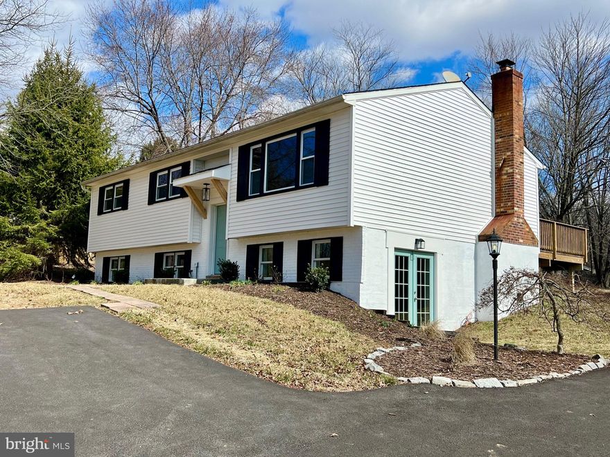 Welcome to 4237 Old Hanover Road - Beautifully renovated 5-bedrooms and 3-full bathroom split foyer home!  Step inside to discover modern vinyl flooring throughout, offering a clean and stylish look.  The open and inviting layout features a spacious living area perfect for entertaining, while the updated kitchen boasts sleek countertops and stainless-steel appliances.  Upstairs, you'll find a private primary suite with its own bath, alongside two additional bedrooms and a full bath.  The lower level includes a cozy family room, two more bedrooms, and another full bath, ideal for guests or a home office.  The walkout lower level provides easy access to the yard and driveway.  With fresh contemporary finishes and ample natural light, this home is move-in ready and waiting for you.  This home is a must see!!