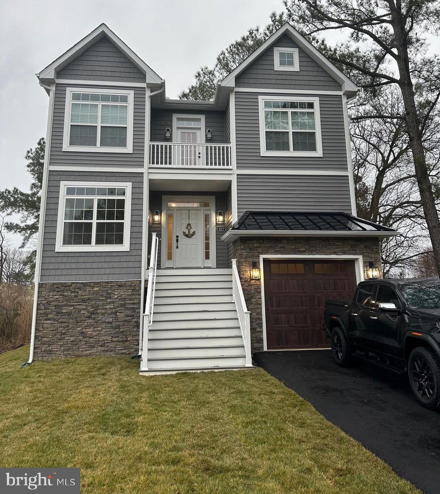 Custom build home with water views. 
9 foot ceilings on both levels and crown molding. Oversized windows provide plenty of light. Matt black hardware for doors.  
Kitchen living room is open concept and has oversized island finished in quartz and filled with natural light.
Primary bedroom has walk in closet and large bathroom with custom quartz vanity tops and cut to fit glass shower door.  
Home office has upgraded trim and water views of No Name Creek.
First level bedrooms share a full sized private deck and are connected by a Jack and Jill bathroom with quartz tops.
Separate full sized laundry room with cabinetry.
Tall garage has a loft built for additional storage. 
Large crawl space that you can walk into. 
Large walk in Crawl Space had drain tile, sump pit, concrete slab and is spray foamed. (walk around back to check it out)
Too many upgrades to list.
A must see!!