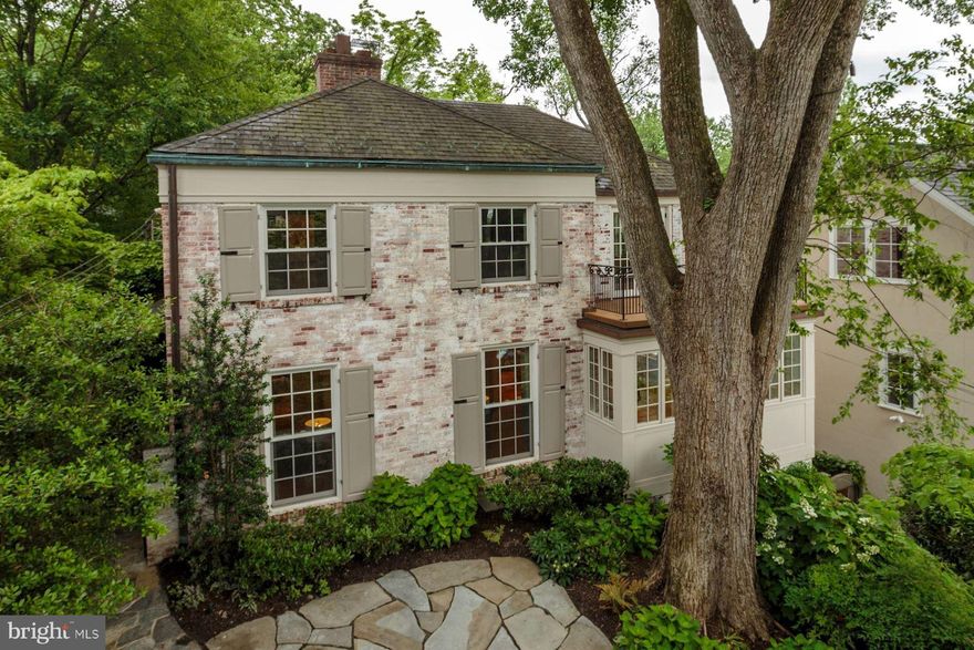 Surprisingly large fully remodeled Wesley Heights home offers expansive rooms & privacy.Kitchen w/professional grade appliances& b'fast room. 6BR/4.5 remodeled baths.Stunning master w/2 walk-ins, large balcony, dream bath.Extra large Living Rm, Family Rm,Sunrm, Office, Dining Rm on Main. Recroom, BR, FB in Basement, Garage, Grounds:Multiple Patios, Deck, Swing, Pond.2 blks to Starbucks,Wagshall's