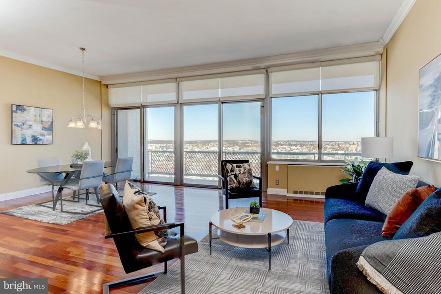 NOTE:  HOA Fee Covers:

*Electric
* Gas
* Water
* Heat
* Basic Cable & Internet
* Concierge & Doorman

This is it! You earned it.  The plush lifestyle, gorgeous views & light from this top floor residence are enviable! Hi-ceilings and walls of windows that lead to the large terrace extended from the Lr/Dr and faces what's lovingly referred to as the quieter, "European Village View".  It is perfect for having coffee or relaxing after work with your drink of choice. Beautiful hardwood floors, abundant bedrooms, contemporary baths, large walk-in pantry, and well-laid out closets. Laundry facilities in the unit as well as in the building (should you require larger machines).  Did I mention the indoor/outdoor pool and fitness center-which is slated to be updated in 2022.  Treat yourself to a low-maintenance lifestyle with on-site businesses, building maintenance, all utilities AND basic cable included in the association fees, 1 parking spot ($170/month), plus free shuttle service around the city and recent updates to the décor.  If this is the lifestyle you have been looking for, don’t miss this one.