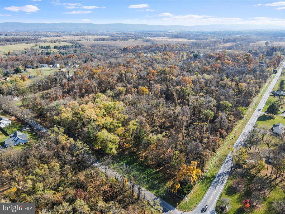 Rare opportunity to get a private lot with mature trees in southern Jefferson County, only minutes to Virginia state line! Corners are marked and septic system installation has been approved (copy of health department letter available). Limited property restrictions! Bring the animals--hobby farms are ok! Build your dream home within easy driving distance of DC, and located adjacent to several desirable subdivisions.