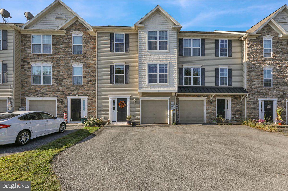 Welcome to 117 Ironwood Court in East Cocalico Twp! This Cocalico School District townhome offers three bedrooms, 2.5 bathrooms, and an oversized one-car garage with plenty of off-street parking. The main level of the home features hardwood flooring and a spacious living room. This room transitions nicely into the kitchen and dining area. A half bath is also conveniently located on this floor. Upstairs, you will find the large master suite with a walk-in closet and private bath. There are two more bedrooms that share the second full hallway bathroom. All the carpet in the home was replaced within the last year. The dining area provides access to a deck that offers beautiful views of township-owned land. In addition to lower taxes, this townhome community does not have a monthly HOA fee. Lastly, the PA Turnpike can be accessed in just minutes. Do not miss this great opportunity!