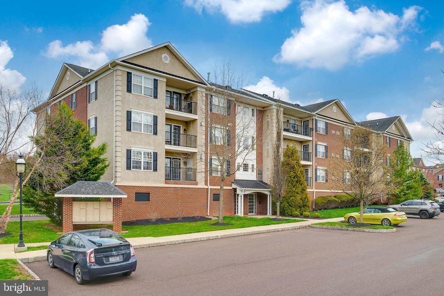 Do not miss the chance to purchase this Beautiful Third Floor Condo in Desirable Biltmore Estates! Located within walking distance to Skippack Village, this 2 Bedroom 2 Bath condominium has been kept in great condition and is ready to move in. When you first walk into the wood Foyer, you will immediately notice the open floor plan which makes this a great space for gathering! The large Living Room with Vaulted Ceilings and wood floors has a cozy gas fireplace that provides plenty of warmth during colder months. Off the living room is your private outdoor balcony that is a wonderful place to relax and view the nearby woods. The kitchen features extra tall cabinets, lighting and plenty of counter and cabinet space along with gas cooking and white appliances. The Primary Bedroom features a vaulted ceiling and a large walk-in closet and a master bath with a tub and shower enclosure. The second bedroom also contains ample space and is served by a separate hall bathroom. The unit has been well maintained freshly painted and ready for a quick closing. A Reserved parking space is included in the private lower level garage. There is a short walk to all of the shopping and dining Skippack Village has to offer! You are also just minutes from Palmer Park, Evansburg State Park and the PA Turnpike. This home will not last long so see it today