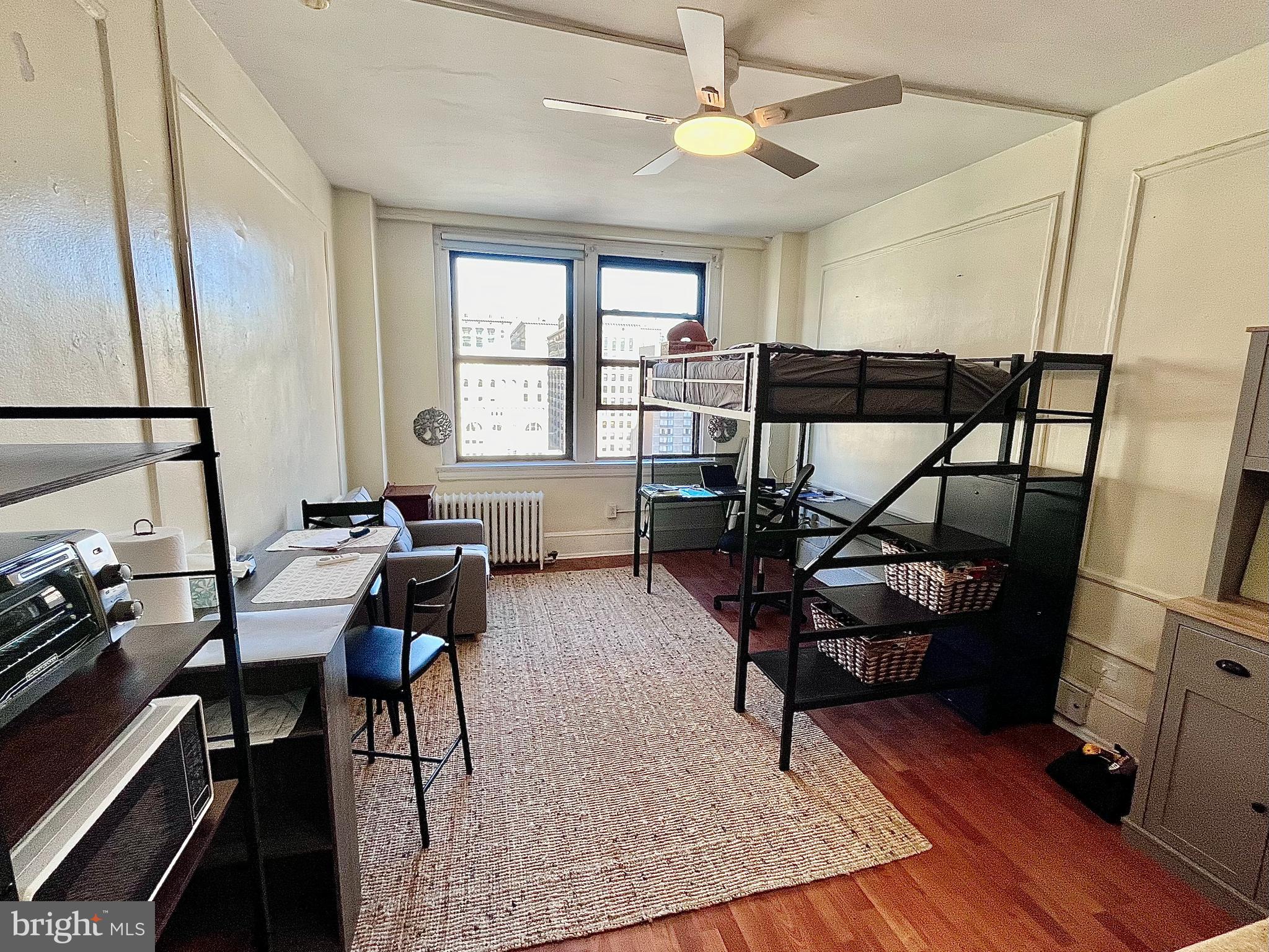 Move in Special! $1150 for the first 6 months!
Furnished Studio apartment available on the 14th floor of the historic Arts Condos building. Blocks away room the broad st line, EL, and numerous bus routes. Restaurants, bars, shopping, nightlife, and daylife is literally right outside the elevator.
Full bathroom with tub. Kitchen with fridge, storage, electric range, sink. Dishes, cookware, and all kitchen utensils included. Yes including the air fryer!
The rest of the space includes a mirrored closet, dining table and seating, chair that can be pulled out for reclining to the max.
A few steps up lead to the full sized sleeping area. Below is a desk space perfect for studying, work, or writing an award winning novel.
All utilities are included. Building includes a gym, community room, mail room, bike room, laundry room, and front desk.
Sorry no pets.