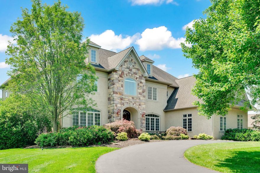 This one checks all the boxes!
If you’ve been searching for a sophisticated home on a premium lot that offers privacy, natural beauty —ideal for year-round entertaining—look no further than 526 Monticello Lane in Whitemarsh Township.
The main level welcomes you with a grand entry foyer,  an expansive great room with  a volume ceiling, a fireplace, and a built-in entertainment center.  The open-concept kitchen with a breakfast room flows effortlessly into the formal living and dining rooms, complemented by a butler’s beverage area, a private study, and two powder rooms—perfect for both daily living and gracious entertaining.
Upstairs, the primary suite offers a serene retreat with a sitting area, spa-like bathroom, and two custom walk-in closets. Four additional bedrooms with Jack and Jill bathrooms, a laundry room, and a built-in homework/study nook complete the upper level.
The finished lower level is designed for all ages and interests, featuring a play area, home gym, recreation/game room, a full bath, and a built-in refreshment station.
Step outside and fall in love with the incredible backyard oasis—complete with a spacious deck, paver patio, tranquil koi pond, and lush, professionally landscaped gardens. Whether you're hosting a summer party or enjoying a quiet evening, this outdoor space is truly special.
Additional highlights include a side-entry 3-car garage, convenient back staircase, and a prime location in the award-winning Colonial School District, with easy access to major roadways and nearby train stations for a quick commute to Center City.