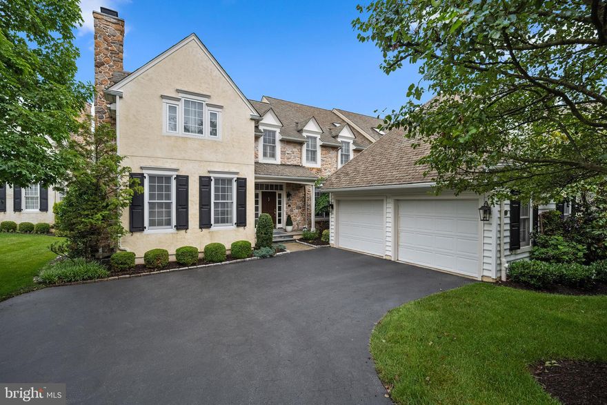 In the prime yet serene, highly coveted community of Applebrook sits this lovely 4 BR, 3.5 BA carriage home with so many sought-after features, it presents as pure perfection. The center foyer anchors the entire downstairs and provides a line of sight straight through to the inviting deck traversing back as the whole of the home. The Foyer radiates a fireside living room, a complete, formal wainscotted-studded dining room, and a powder room hallway that includes a double closet and provides the office with shelter and privacy for those seeking maximum efficiency while working from home. Opposite the powder room hallway is the sweeping stairway to the second level. Behind the office is a beautiful fireside family room that flows to an incredibly well-appointed island kitchen adjoined by a bright, roomy breakfast room. Continue around the marvelous chef’s kitchen containing redundancy in practically every appliance, past the Viking cooktop and the center island with granite counters, and discover the butler pantry strategically placed between the kitchen and dining room. Along with the fabulous kitchen, the butler pantry, additional dishwasher, wine fridge, wine storage, and cabinetry will make entertaining a snap. Completing the first level is a large laundry room that accesses the 2-car garage. 
The upper-level houses a spectacular principal bedroom that includes a fireside sitting room, double walk-in closets with closet systems, and an unsurpassed bath resplendent with two exceptionally-sized, quartz-topped vanities on each side of the room, as well as a tile shower, separate toilet closet, and a delightful soaking tub for easy relaxation. The upper level also contains bedrooms 2 and 3 that share a bath with shower and toilet while maintaining separate dressing rooms, each with a luxurious vanity. Bedrooms 2 and 3 also include oversized, walk-in closets with well-designed closet systems. The upstairs landing features an enchanting window seat nook, ideal for cozying up with a good book.
Emanating from the foyer, you’ll also find the stairway to the finished lower level, which is approximately 1000 sq. ft of finished space–-a great area that is practically a home. With a massive flex space currently used as a living area that leads to its patio, plus a kitchenette, a 4th bedroom with en suite bath, a gym, a vast cedar-lined closet, a mechanical room, and a spacious storage room, this level wows you at every turn. Each square inch of this home is filled with thoughtfully designed details, including hardwood floors, built-ins, and gorgeous crown molding.  Welcome to your dream home for years to come.