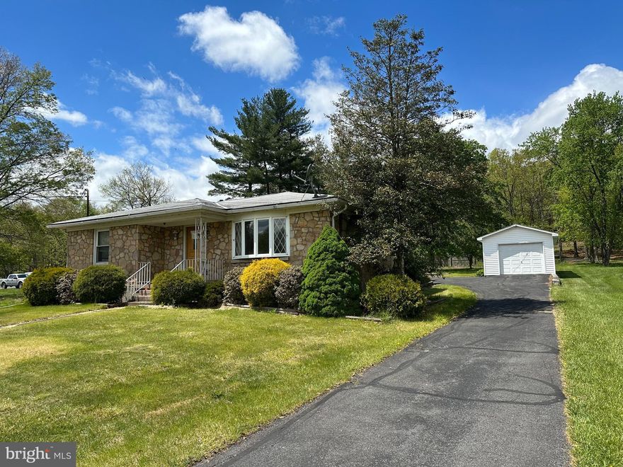 Nice 2 bedroom home with addition of family room and second bath on the main level featuring a large living room with fireplace, updated kitchen with lots of cabinet space and including all appliances. The main bath has jetted soaking tub and the second bath has a shower. Heating is provided by a forced air gas system with central AC for those hot summer days. The large family room is perfect for entertaining or just relaxing. You'll enjoy the covered real patio that's great for picnics. The septic system was recently replaced.  You'll find plenty of parking accessed by a circular paved drive, there is a 1 car garage with workshop space plus a carport and storage shed in the rear. call today for a showing.