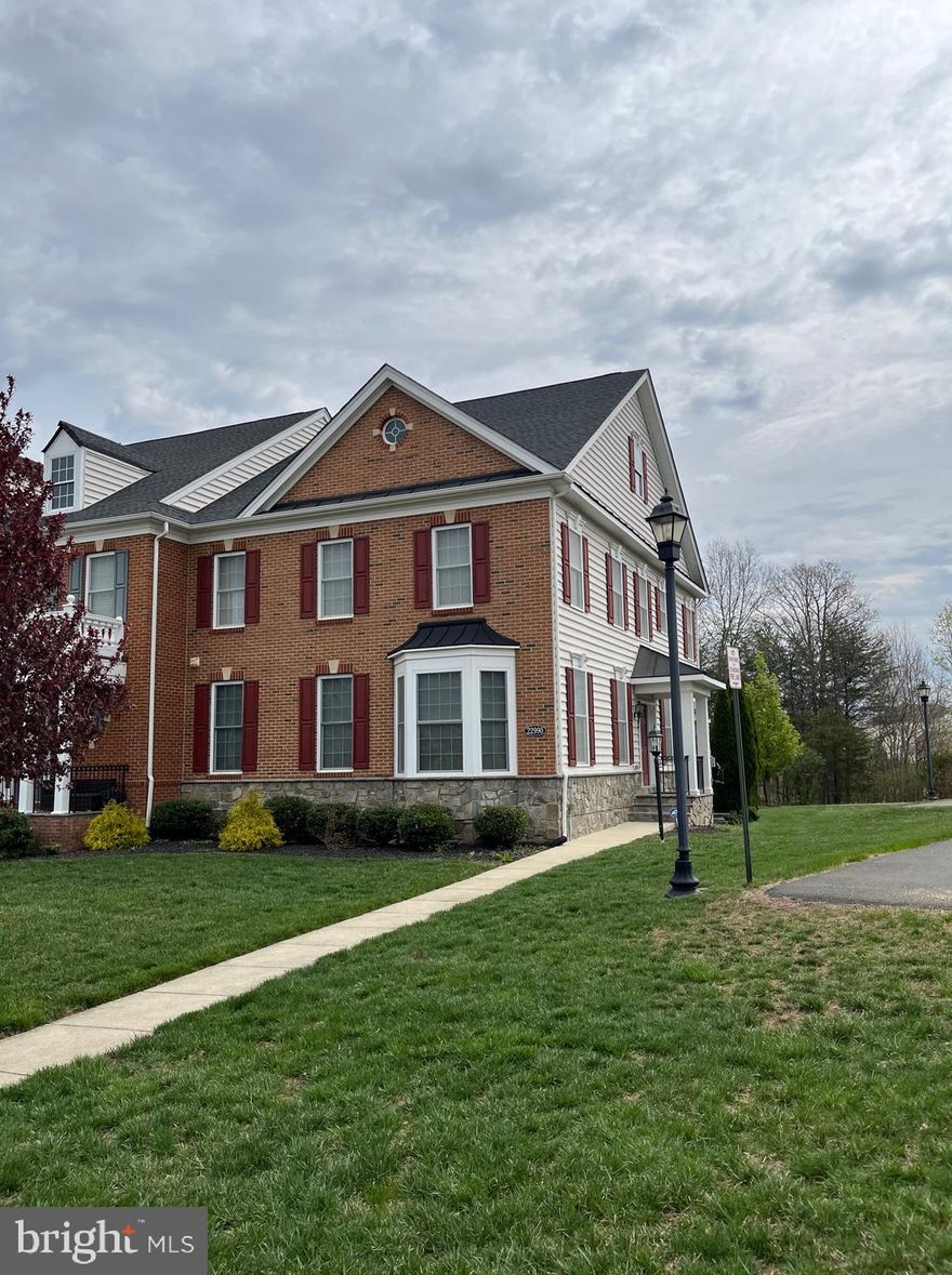 Welcome to 22990 Chertsey Street, an exceptional 3-level end-unit townhome nestled in the heart of Ashburn! This stunning brick-front residence offers the perfect blend of charm, space, and value—priced $30K below market for a quick sale!

Meticulously maintained and move-in ready, this sun-drenched home features abundant windows, elegant architectural details, and beautiful curb appeal with professional landscaping. Enjoy added privacy and extra yard space thanks to its premier end-unit location.

Step inside to discover spacious living areas, high ceilings, and modern finishes throughout. Whether you're entertaining in the open-concept main level or relaxing in the large owner’s suite, this home offers comfort, convenience, and style at every turn.

Don't miss this incredible opportunity to own a well-appointed townhome in one of Ashburn’s most sought-after communities—close to shopping, dining, major commuter routes, and top-rated schools!