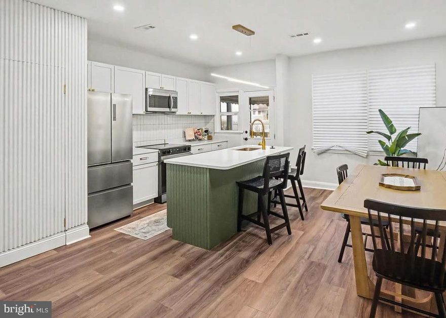 Welcome to this fully renovated 3-bedroom, 2-bath home offering modern style and exceptional functionality. The stunning kitchen features brand-new appliances, sleek quartz countertops, and a luxurious island perfect for entertaining. Beautiful wooden door panels lead to a fully finished basement complete with a full bathroom—ideal for guests, a home office, or additional living space. Enjoy the convenience of a rear parking pad, along with updated modern bathrooms highlighted by charming, designer tile. Ideally located just steps away from the Rotunda and Hampden, offering fine dining, multiple restaurants, movies, and entertainment, and only minutes from major highways including Interstate 83. This move-in-ready home blends comfort, quality, and unbeatable location—don’t miss it!