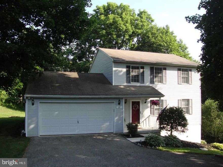 Motivated Seller for secluded Colonial!  3 bedrooms   2.5 bath   over 2000 SF home that offers a tranquil view of Glen Rock.  Move in condition.  Featuring new flooring, new A/C, newer SS appliances, freshly painted, 1st floor laundry with washer and dryer, 22 x 24 family room with walk-out entrance, and 1 year home warranty.
