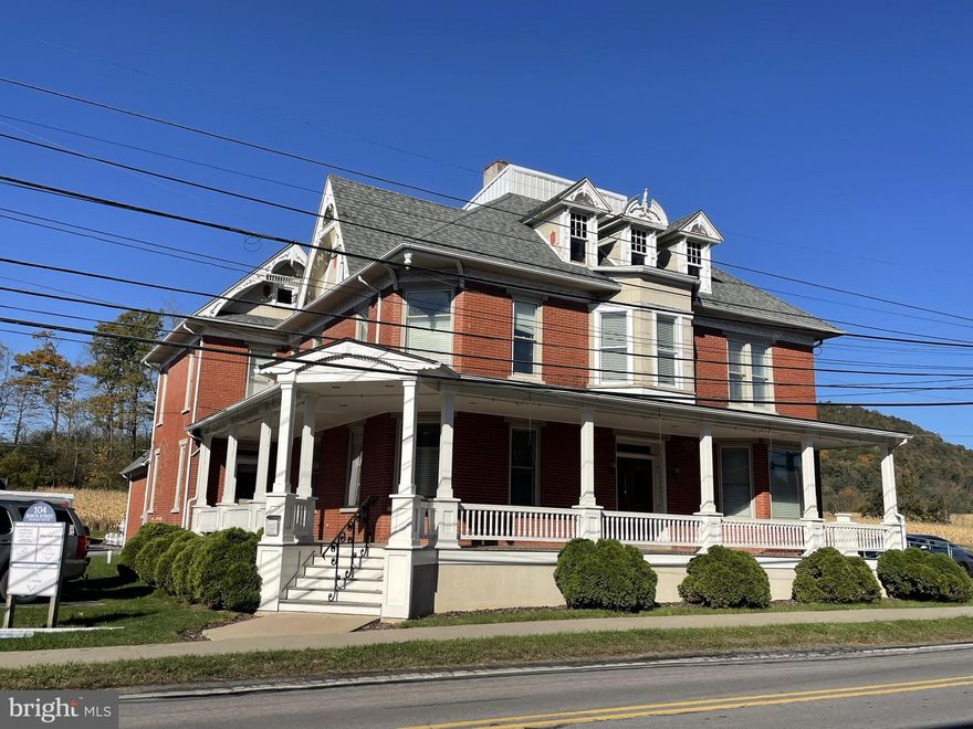 Stunning updated building Commercial building Centrally located to Penn State University, Bucknell University, High quality trout stream, and State Lands. Residence currently being used as an office building.  With the addition of a kitchen and upgrade half baths to full bath, home would be an ideal B&B.  Stunning hard wood floors, oversized rooms, many major updates.  Property is currently income producing of $24,000 per year.

1904 Victorian home restored in 2010 and converted to an office building.  Several stunning features, including a grand staircase in the foyer leading to the second floor, wood floors & trim and pocket doors. Wrap around covered porch with locust flooring, hanging plant watering system & ramp for handicap accessibility.  New wiring & plumbing, dual AC systems zoned by floor; heating system supports oil & coal.  Office building is located just off of Main Street. Located in Historic District