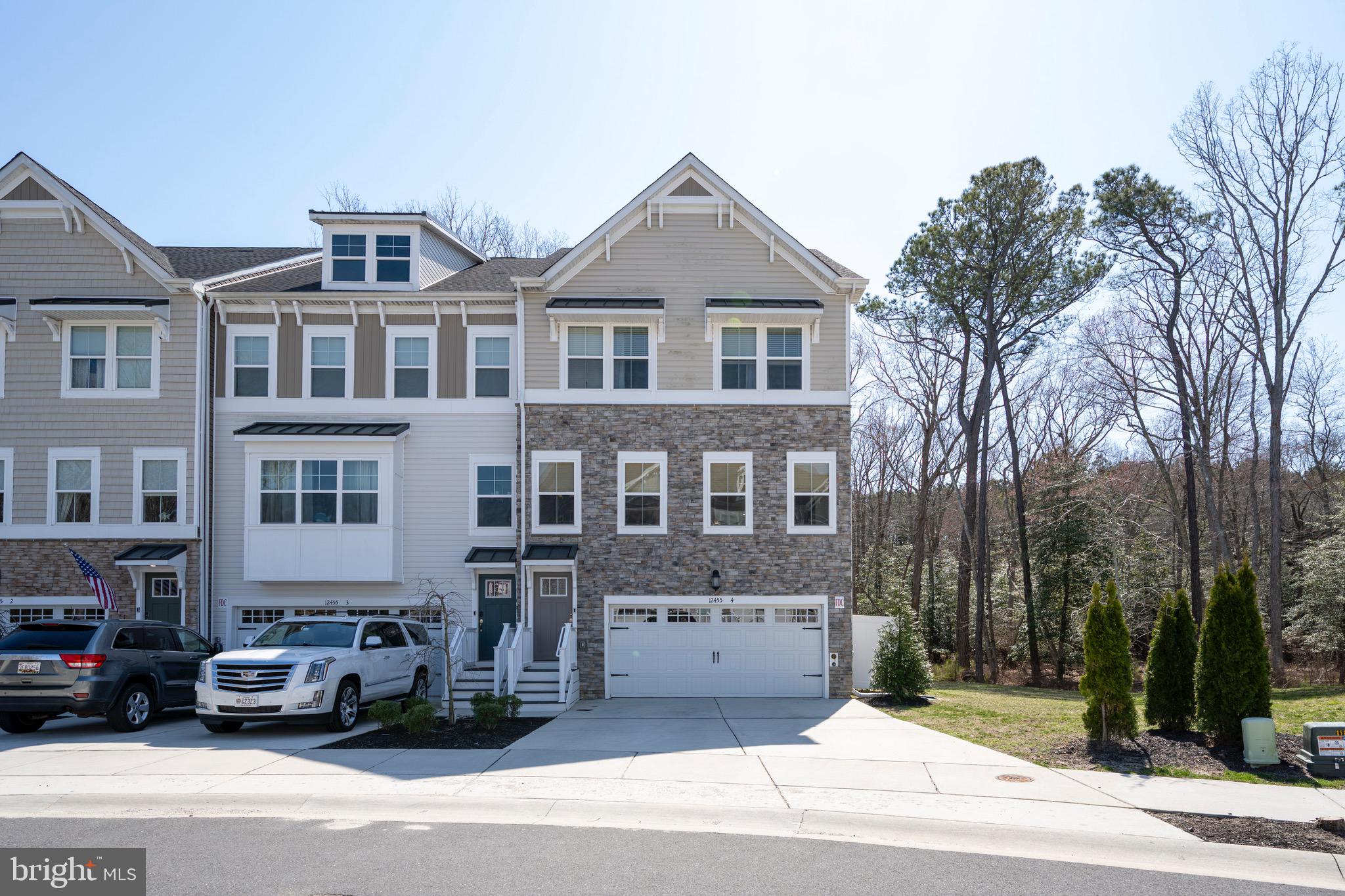 OPEN HOUSE SUNDAY 7/13 11AM-2PM! ***SELLERS OFFERING BUYER RATE BUY DOWN CONCESSION*** Welcome Home to Sea Oaks Village! Discover a vibrant, amenity-rich coastal community designed for making memories. Built in 2021, this nearly new end-unit townhome offers peace of mind with all major systems less than five years old. Enjoy an unbeatable location—just 2 miles from the inlet and no Ocean City taxes! Spanning 2,664 square feet across four spacious levels, this 4-bedroom, 2 full bath, 2 half bath home is thoughtfully designed inside and out. Highlights include a fenced-in yard with a finished porch, a large back deck off the kitchen, an expansive rooftop terrace, and an oversized two-car garage. No detail was overlooked. The entry-level features a welcoming foyer and mudroom, a finished recreation room with a half bath, and access to the backyard and garage—perfect for guests or multi-use functionality. At the heart of the home is a stunning gourmet kitchen featuring a 15-foot granite island, white cabinetry with soft-close drawers, stainless steel appliances, a walk-in pantry, and a wet bar—ideal for entertaining or everyday living. Upstairs, you’ll find three generously sized bedrooms with ceiling fans and ample closet space. The primary suite offers a luxurious en suite bath with a walk-in shower, dual granite vanity, and a large walk-in closet. The top floor is a versatile flex space currently used as a guest room/office, easily adaptable as a fourth bedroom, home gym, movie room, or loft—all with direct access to a private rooftop terrace with breathtaking views. Sea Oaks Village offers exceptional amenities including a private pool, pool house, pickleball court, playground, and scenic pond. Ideally located just off Route 611, it’s a peaceful retreat just a short walk from West Ocean City’s most popular restaurants and minutes from the beach. Make the beach your everyday lifestyle—schedule your private showing today and experience coastal living at its finest!