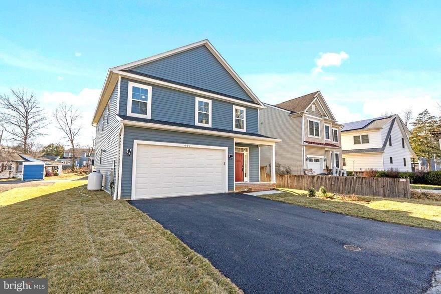 Come live on Paradise! Located in the water priveledged community  of Sylvan Shores this new construction home features 4 bedrooms, 2 and a half baths with an attached two car garage. This light filled open concept home with 9-foot ceilings and 6" wide LVP flooring throughout the main level. As you enter the home there is a  welcoming spacious foyer w/ample double door closet.  Hallway features a powder room & access to 2 car garage. The large sparkling kitchen features SS appliances, gas range, solid surface quartz counters tops, a large pantry and a center kitchen island which overlooks  the family and dining rooms. The  family room features a beautiful gas fireplace w/ shiplap backdrop and a transom window providing additonal light. Upstairs you will find 4 large bedrooms, two full baths and a large  laundry room. The over-sized primary suite offers a very generous walk-in closet as well as a beautiful ensuite, complete with tiled walk-in shower and dual vanity.  The 3 spacious additional bedrooms on upper level feature  abundant light and share a large hall bath with combination tub and shower.  The attached two car garage provides access into the entry way of the home and provides space for extra storage options/shelving. The home features a tankless hot water heater and is sprinklered throughout for added safety. This exceptional  new home has so much to offer! Sylvan Shores is a private water-privileged community set on the scenic South River, Granville Creek, and Hardestys Cove waterways in Anne Arundel County. Amenities for this private community of over 250 homes include water access, boat ramps, a large recreational swim pier, boat docks and slips, kayak/paddle-board racks, a clubhouse with a playground, a ballfield, walkable parkways, and numerous open park spaces. Easy access to Rt. 50, Annapolis,DC, Bay Bridge (Delaware Beaches) Just minutes from  Town Center featuring, Whole Foods, Target, Pottery Barn, Williams Sonoma, numerous eating spots. This new home is also walking distance to a soon to open coffee shop, Mike's country store and  Mike's Crab House!