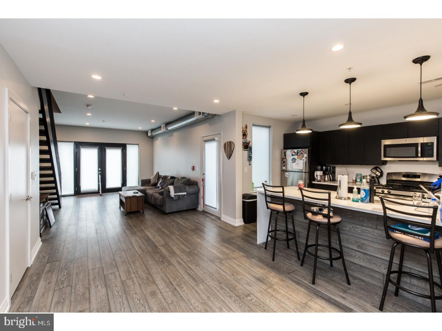Available early July:
Welcome to 512 E Girard Ave #104! This gorgeous 2 bedroom / 1.5 bathroom bi-level unit offers a wide open floor plan, THREE outdoor spaces, & luxurious finishes! Enter into the common area with hardwood floors, recessed lighting, exposed spiral ductwork, and plenty of room for different furniture set ups. The patio doors flood the space with natural light and this great apartment features TWO private patios on the main level, as well as shared access to the building's HUGE roof deck! Head over to your kitchen to view quartz countertops, cabinetry above & below, stainless steel appliances, and an island for extra prep space & counter seating. Continue to the second floor to view 2 sizable bedrooms, both featuring hardwood floors & ample closet space. Your sleek bathroom boasts tile flooring, subway tiling along the walls and surrounding the shower / tub, and a dual vanity with overhead lighting. There is in-unit laundry for ultimate convenience, and building amenities include storage lockers and bike storage in the basement, as well as an expansive roof deck with 360 degree views of the skyline and Ben Franklin Bridge. This great space won't last long- schedule your tour today!
About the Neighborhood:
Nestled in the heart of Fishtown, you'll have tons of shopping, restaurants, and entertainment right outside your door! Walkable to The Fillmore, Brooklyn Bowl, Fabrika, Penn Treaty Park, Hetzell Playground, and Palmer Park. Close proximity to I-95 and surrounded by plenty of public transportation options for a quick & easy commute. You'll want to check out local neighborhood favorites like Lloyd, Interstate Drafthouse, Barcade, Frankford Hall, Milkcrate Cafe, Johnny Brenda's, and countless more!
Lease Terms:
Generally, first month, last month, and one month security deposit due at, or prior to, lease signing. Other terms may be required by Landlord. $55 application fee per applicant. Pets 30 lbs and under are conditional on owner's approval and may require an additional fee and/or monthly pet rent, if accepted. (Generally $500/dog and $250/cat, and/or monthly pet rent). Tenants responsible for: electricity, gas, cable/internet, and water.