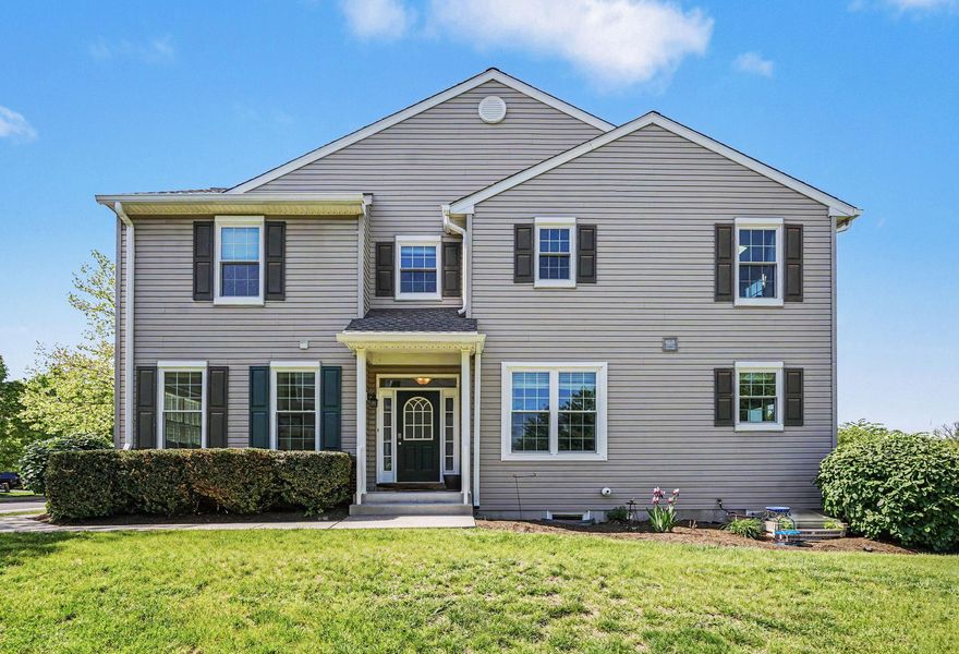 Nestled in the charming Providence View community, this delightful end-of-row townhouse offers a perfect blend of comfort and style. Built in 2003, this Colonial-style home boasts a generous 2,500 square feet of thoughtfully designed living space, ideal for creating lasting memories. Step inside to discover a warm and inviting interior featuring a mix of hardwood, tile,vinyl and carpet. The heart of the home is the spacious eat-in kitchen, complete with upgraded countertops, an island for casual dining, and stainless steel appliances, making it a joy for both cooking (cooktop was upgraded to induction) and entertaining. The main level also features a convenient half bath, while the upper floor hosts three well-appointed bedrooms, including a master suite with a soaking tub and a separate shower. The laundry area is conveniently located on the upper level. Venture outside to enjoy the beautifully maintained exterior, complete with sidewalks and street lights that enhance the neighborhood's charm, with a bonus being situated at the highest point in the community with great views of the surrounding area. The rear yard backs onto an open common area, providing a serene backdrop of trees and woods, perfect for outdoor activities or simply unwinding. A spacious deck extends your living space outdoors, ideal for summer barbecues or morning coffee. The attached 1-car garage with inside access and an additional driveway space, ensures ample parking for you and your guests. The community amenities are a true highlight, featuring a fitness room, swimming pool, and well-kept common grounds, all included in the association fee. With brand new Pella windows throughout and beautifully-maintained interior spaces, this home is one to see! Whether you're looking for a peaceful retreat or a vibrant community, this property offers the best of both worlds. Experience the comfort and convenience of Providence View - your new home awaits!