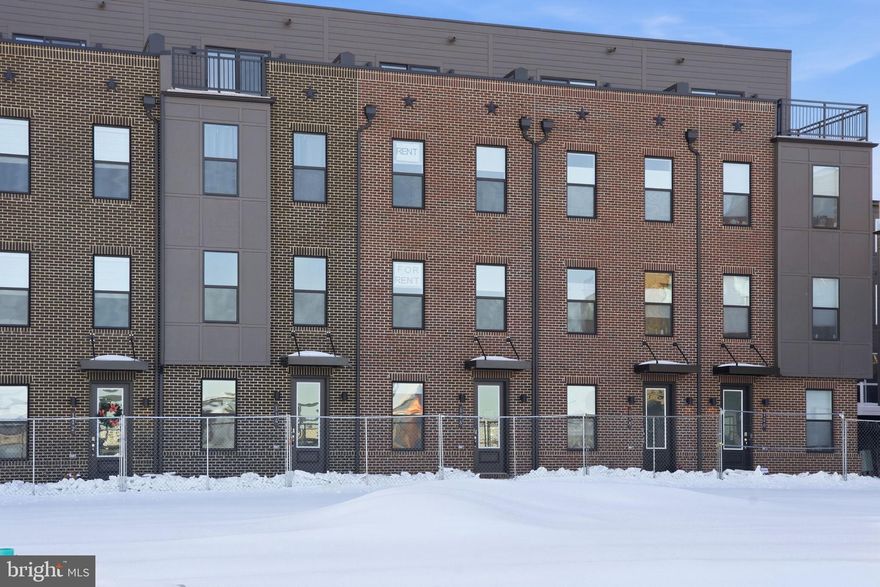 Be the first to live in this brand-new 2,061 sq. ft. luxury townhome located in the heart of the exciting Baltimore Peninsula, directly across the street from the new Under Armour Global Headquarters, within the vibrant waterfront community of Locke Landing. This spacious 4BR/4.5BA home offers premium modern living with a gourmet kitchen, designer fixtures, premium finishes, and generous countertop space perfect for cooking, entertaining, and everyday convenience.

Thoughtfully designed with an open-concept layout, multiple ensuite bedrooms, abundant natural light, and a convenient one-car garage, this home provides comfort, storage, and flexibility for any lifestyle. Enjoy exceptional outdoor living on your private rooftop deck, ideal for relaxing, entertaining, or taking in neighborhood views.

Unmatched walkability to the waterfront, scenic parks, acclaimed restaurants, shops, entertainment venues, and vibrant local hotspots. Lock Landing also offers outstanding community amenities—including a beautiful outdoor pool opening next summer—creating a true resort-style living experience.

A rare opportunity to rent never-lived-in luxury construction in one of Baltimore’s fastest-growing waterfront neighborhoods.  Property is close to I-95 N/S via exit 54 and MARC railway stations. Nearby amenities include Nick's Fish House, Rye Street Tavern, and Nineteen O'Nine, and many more.