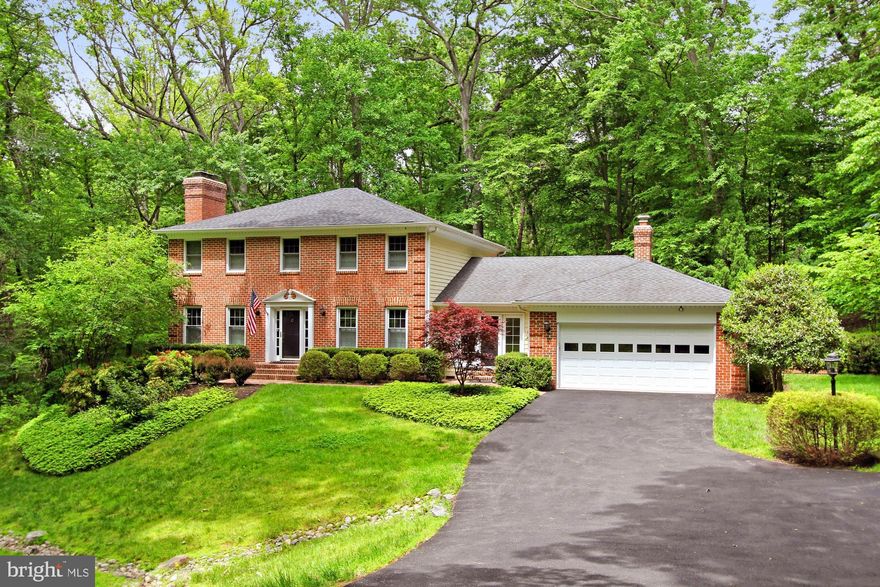 PRICE IMPROVEMENT!!  221 Falcon Ridge is located in the lush, rolling desired neighborhood of Falcon Ridge!   An ageless community well known in Great Falls of Northern Virginia in the Langley school district.  This 3 sides brick exquisite John Carver model with formal entry and gorgeous gourmet kitchen will impress everyone who walks through the front door from the beautiful brick walkway.   Elegance and Pride of Ownership reflects a sparkling and clean home for your appreciation and future enjoyment.  There is a Library or Office for study as well as a huge Great Room and an extended Solarium.  Main level has French doors leading to an expansive deck from the both the gourmet kitchen and  kitchen dining area and from the Great Room and Solarium.   PLEASE don't miss the potential upper level play area or entertaining area in the rear of the property above the deck area.  Perfect for a future swing set or secluded dining.  Perfect flow for your entertaining.   Visit the lower level for exercise, entertainment and a private entrance for an au pair or guests on an extended stay offering a bright 5th bedroom along with private full bath.   Upper level is light and bright with 4 bedrooms and two bathrooms.  You will enjoy spending your summer in the quiet landscaped acre of 221 Falcon Ridge and enjoy shopping and amenities in the Town of Great Falls  all within driving distance to the employment centers of Reston, Tysons/McLean and D.C.  Langley district.