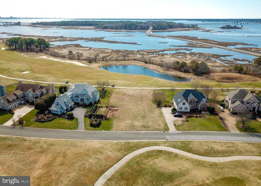 "PRICED TO SELL" ... PRIME residential lot in Lighthouse Sound, a prestigous golf course community located on the western shore of Maryland’s Assawoman Bay, only five miles from the beaches of Ocean City. Nestled among natural ponds and pristine marshland the Lighthouse Sound community overlooks Atlantic coastal bays and the Ocean City skyline. Traditional single family homes here are reminiscent of upscale cottages and manor houses of the Hamptons. Lighthouse Sound homes offer spectacular water and golf views and lie just minutes away from the beaches. The golf course, The Links at Lighthouse Sound, is a prestigious golf facility, incorporating a fine dining restaurant among other features. You’ll find that building your home here is what dreams are made of! The lot features public water and sewer hook-up, plat is done and recorded, just need you home plans. Whether you’re looking to build a full-time residence or a vacation retreat, this location provides the ideal coastal living experience.